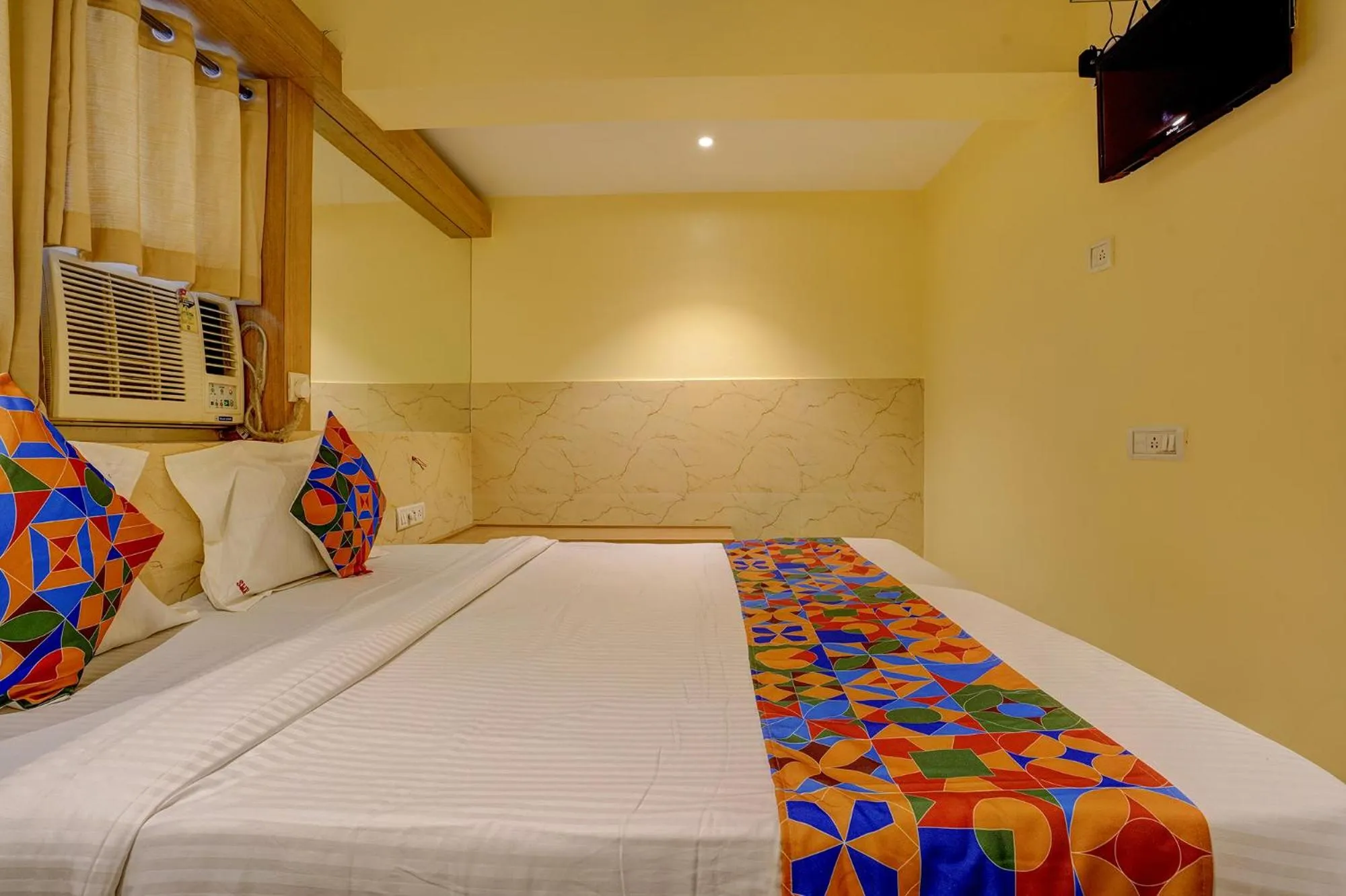 Bed in FabHotel Starwood Residency - 100M From Dr DY Patil Stadium
