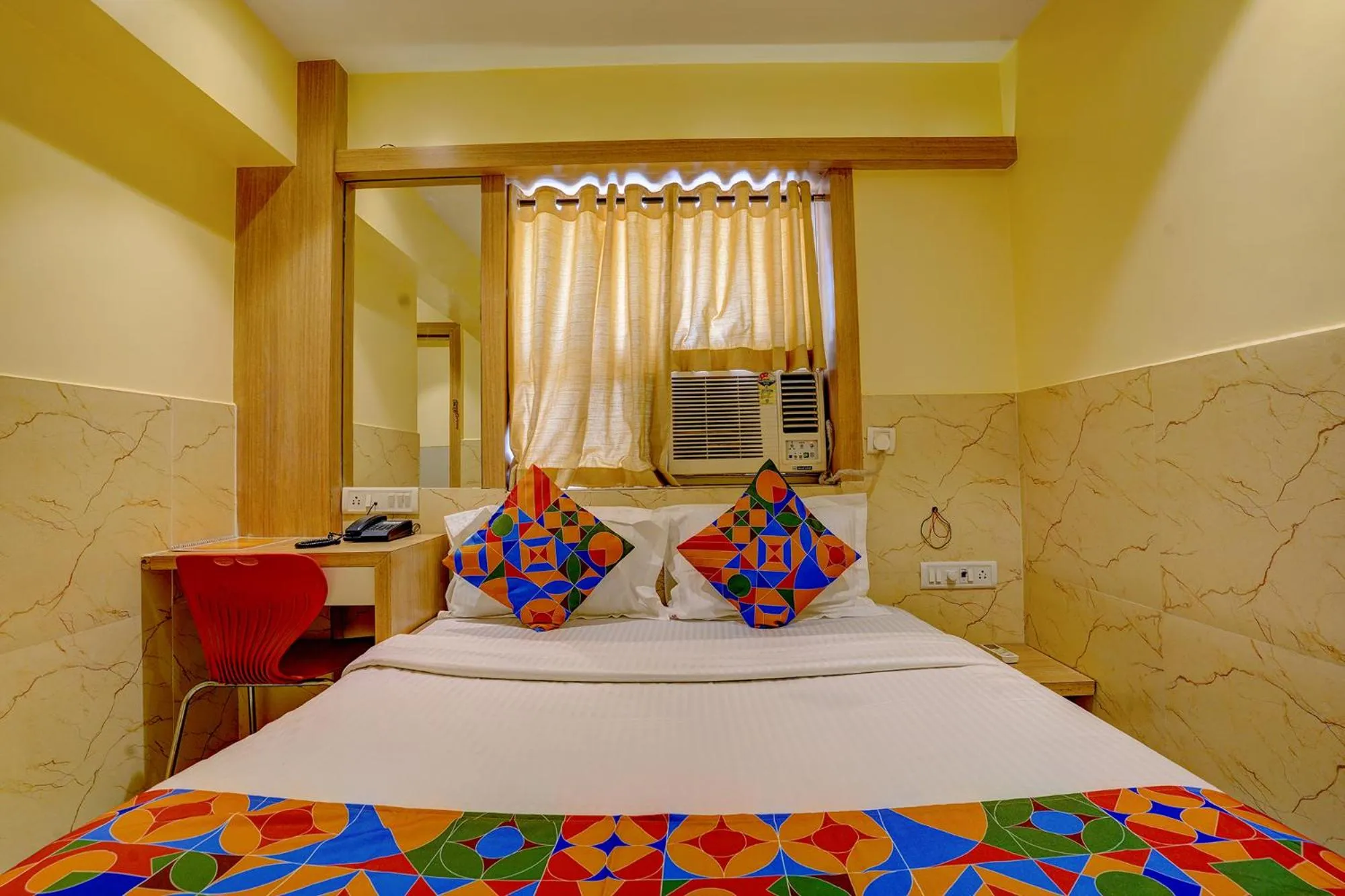 Bed in FabHotel Starwood Residency - 100M From Dr DY Patil Stadium