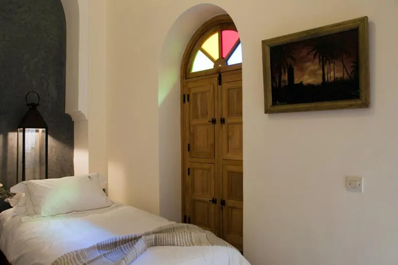 Bed in Riad Granvilier