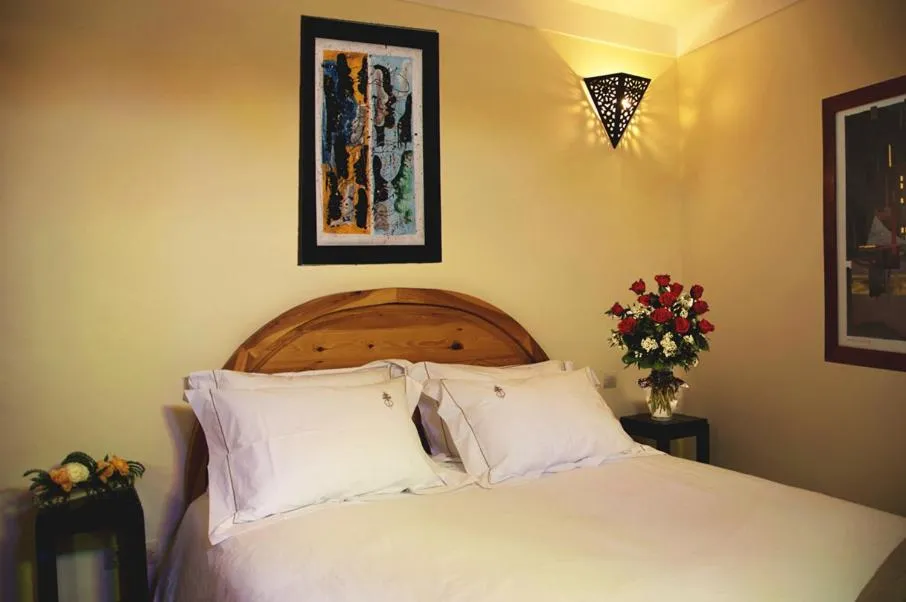 Bed in Riad Granvilier