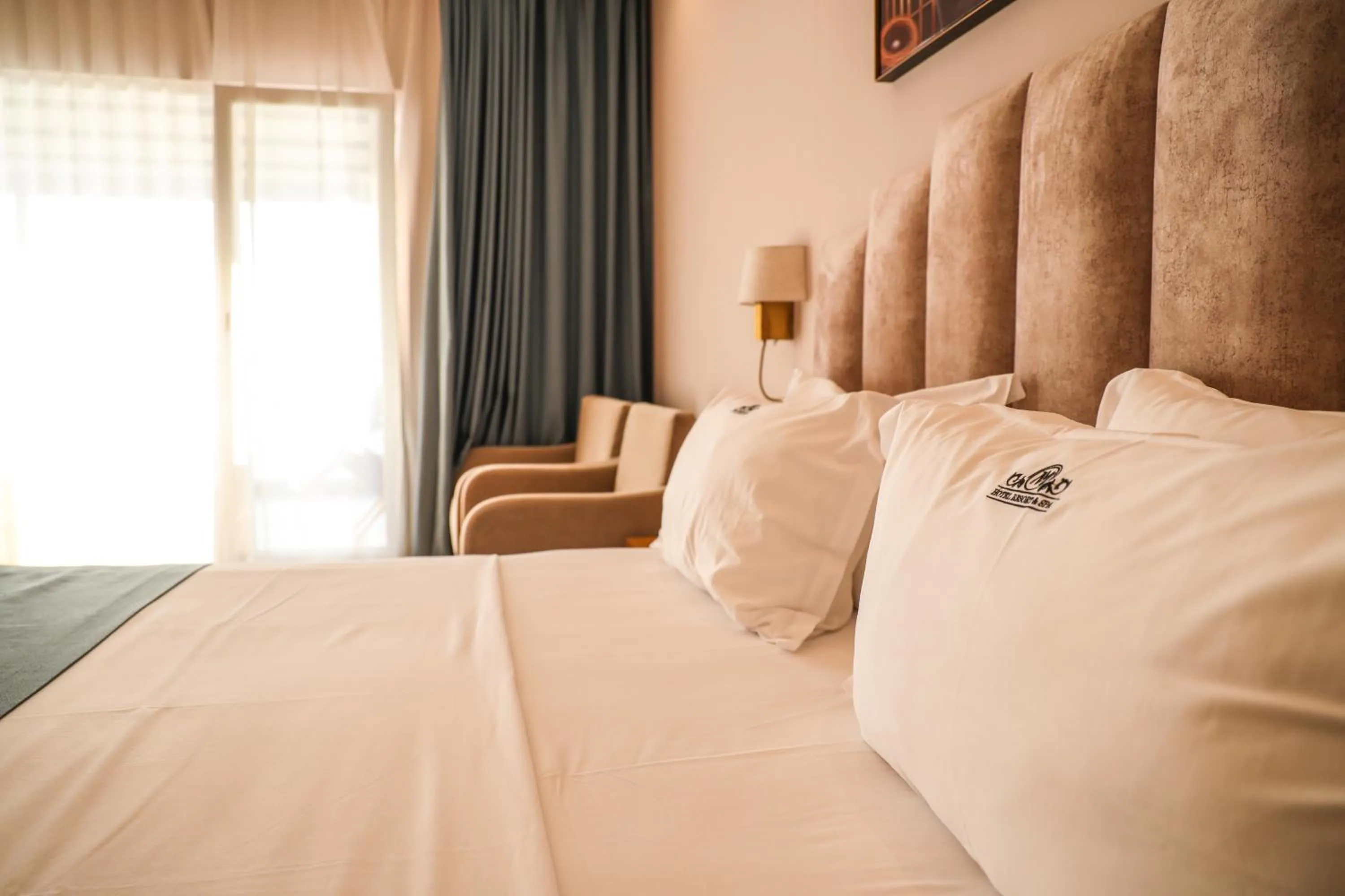 Bed in VM Resort & SPA