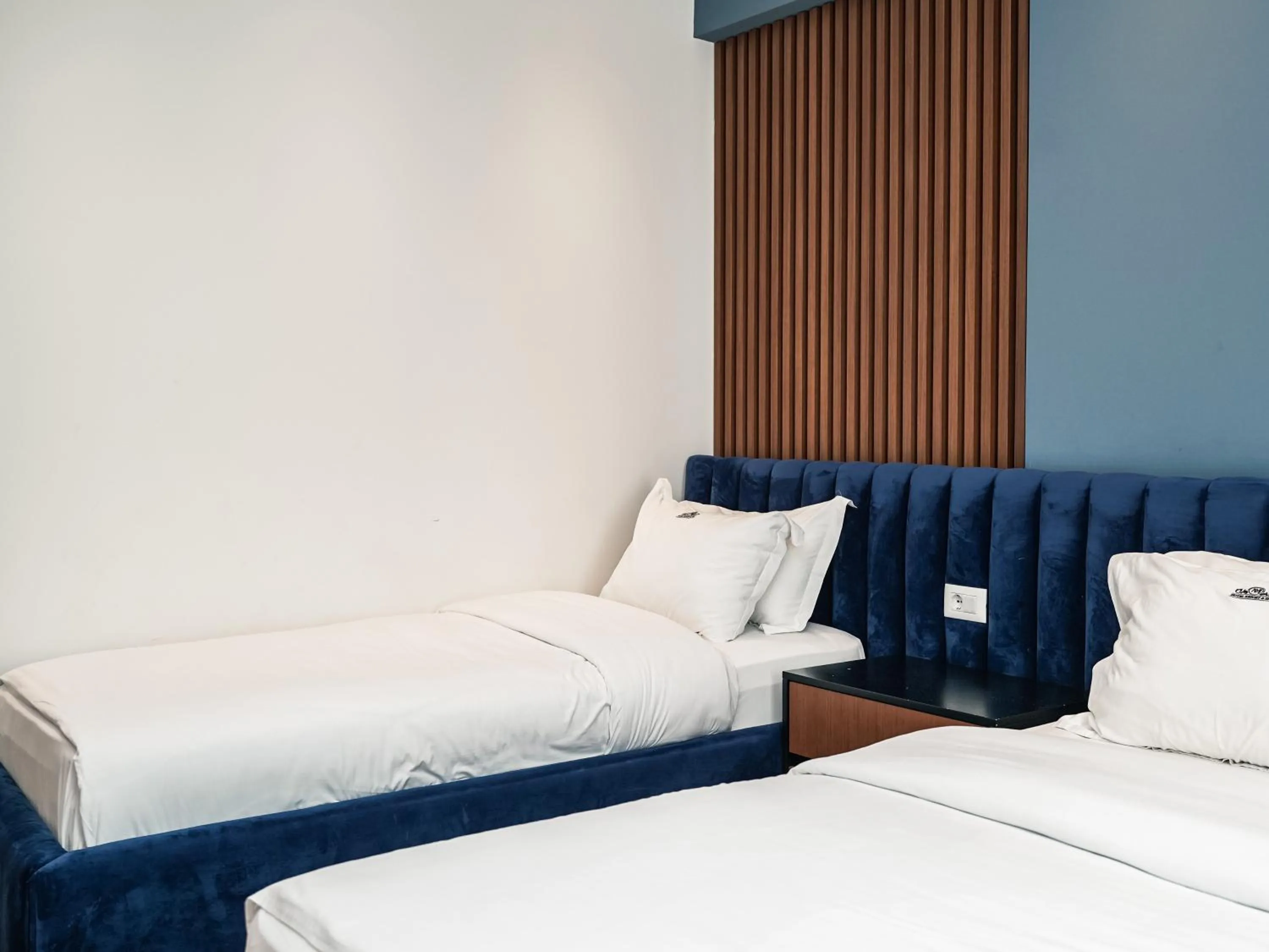 Bed in VM Resort & SPA