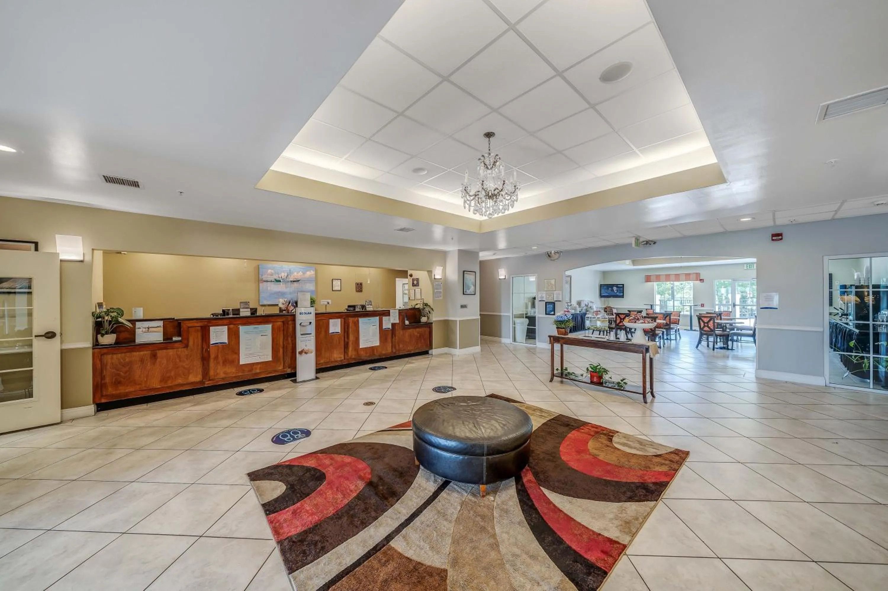 Lobby or reception in La Quinta by Wyndham PCB Coastal Palms