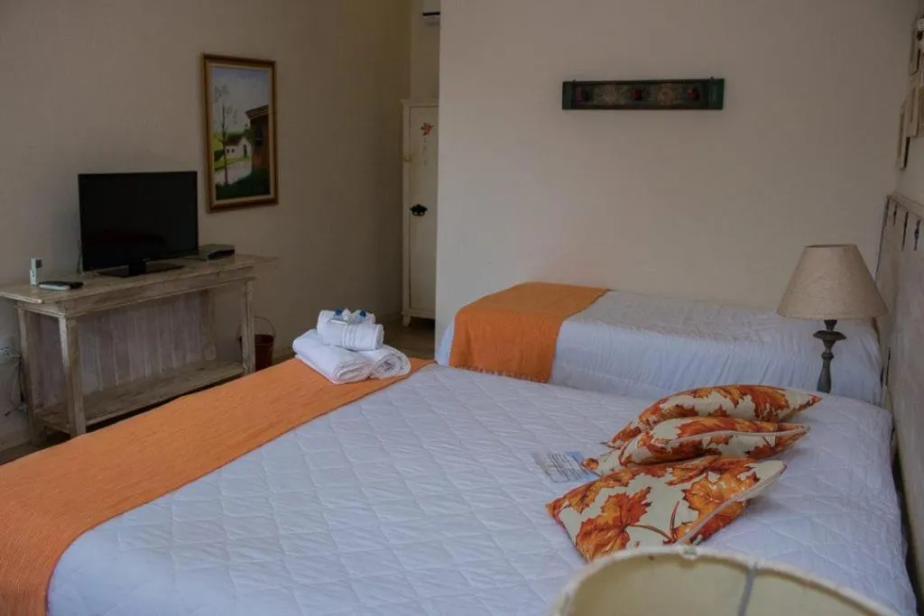 Bed in Pousada Hospedaria da Villa