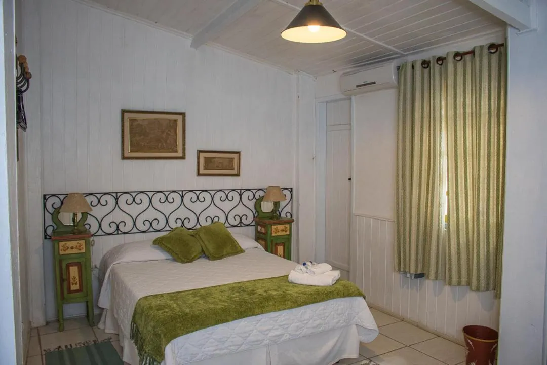 Bed in Pousada Hospedaria da Villa
