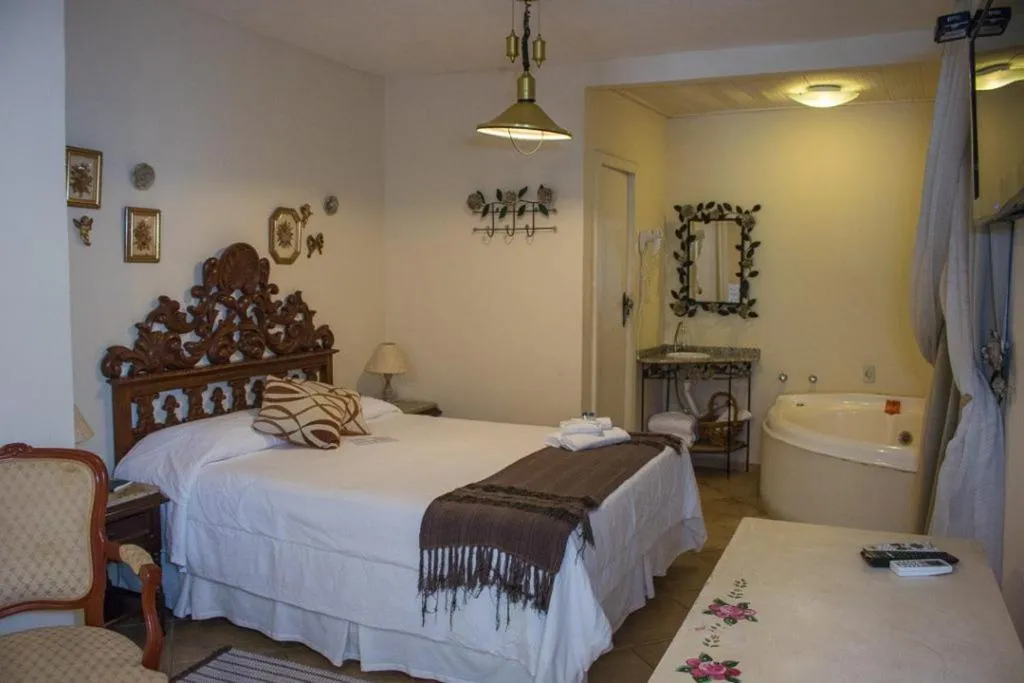 Bed in Pousada Hospedaria da Villa