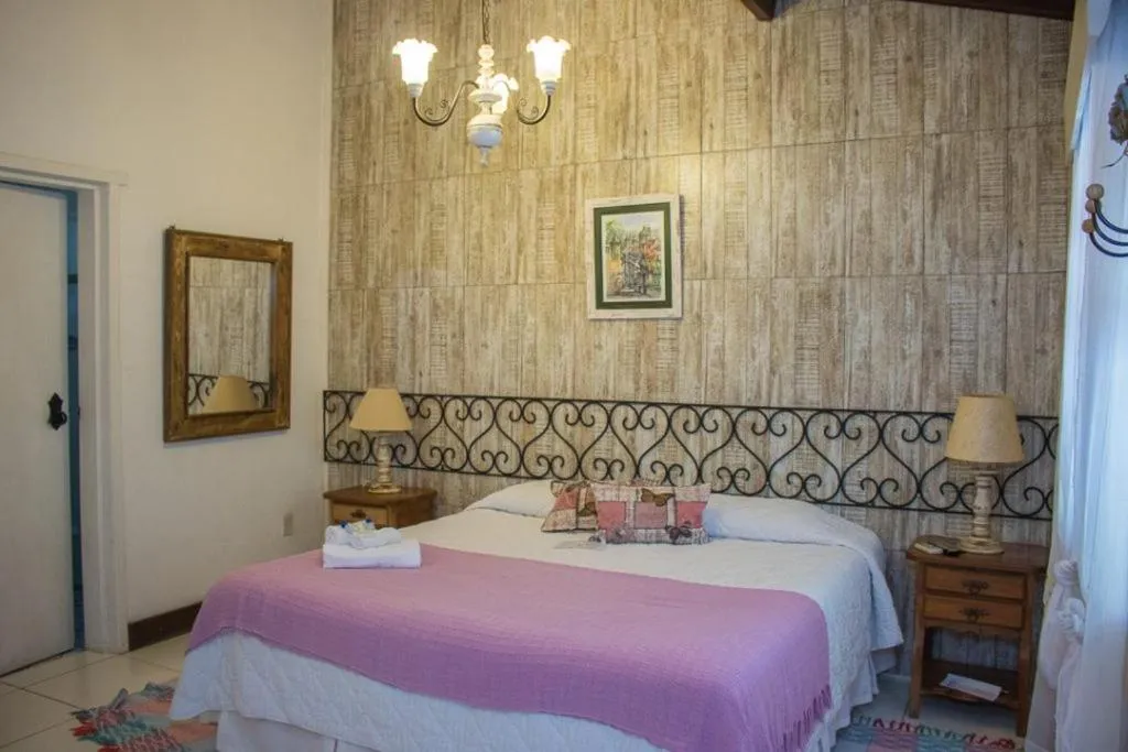 Bed in Pousada Hospedaria da Villa