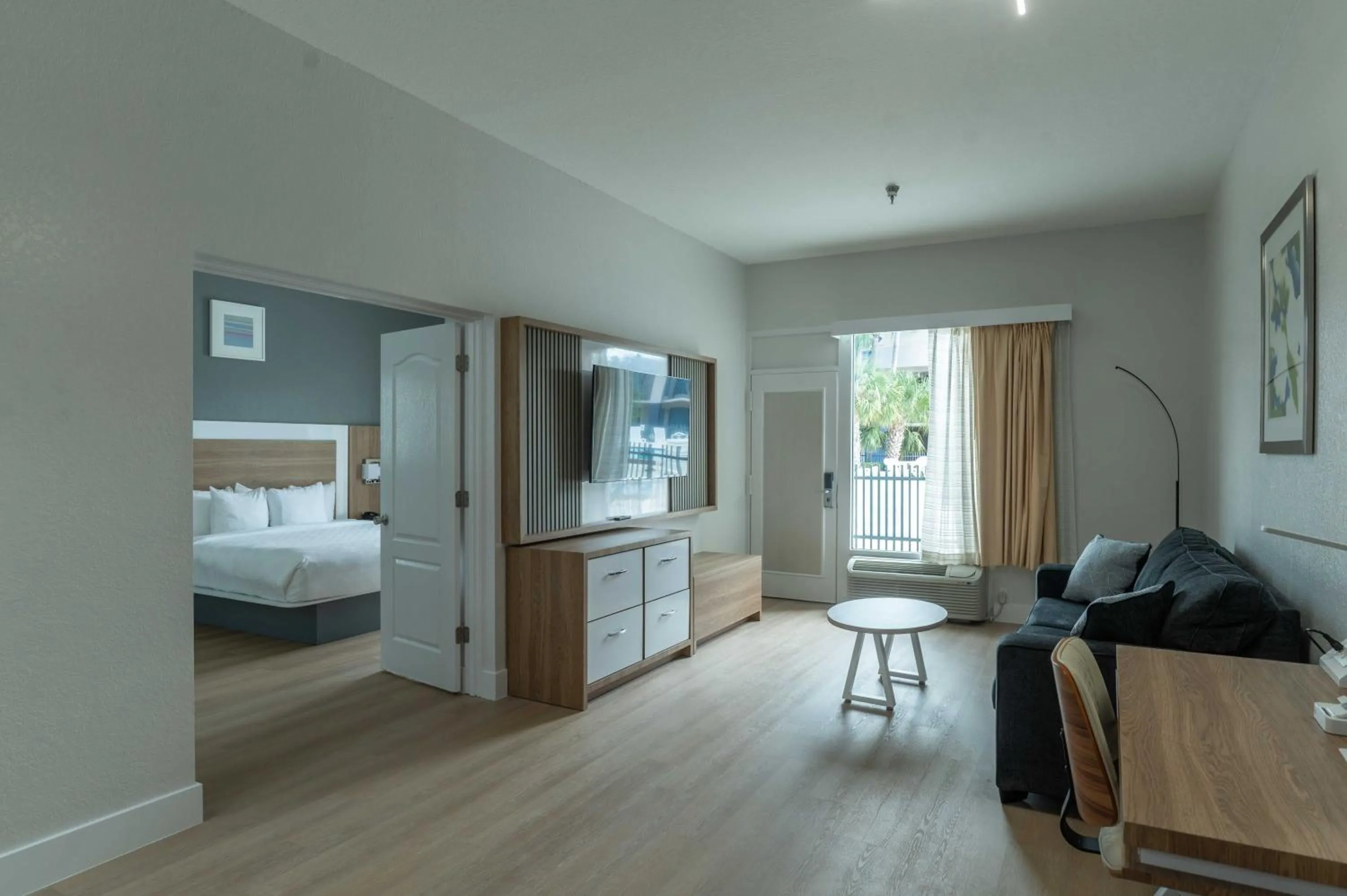 Bed in Clarion Inn & Suites Central Clearwater Beach