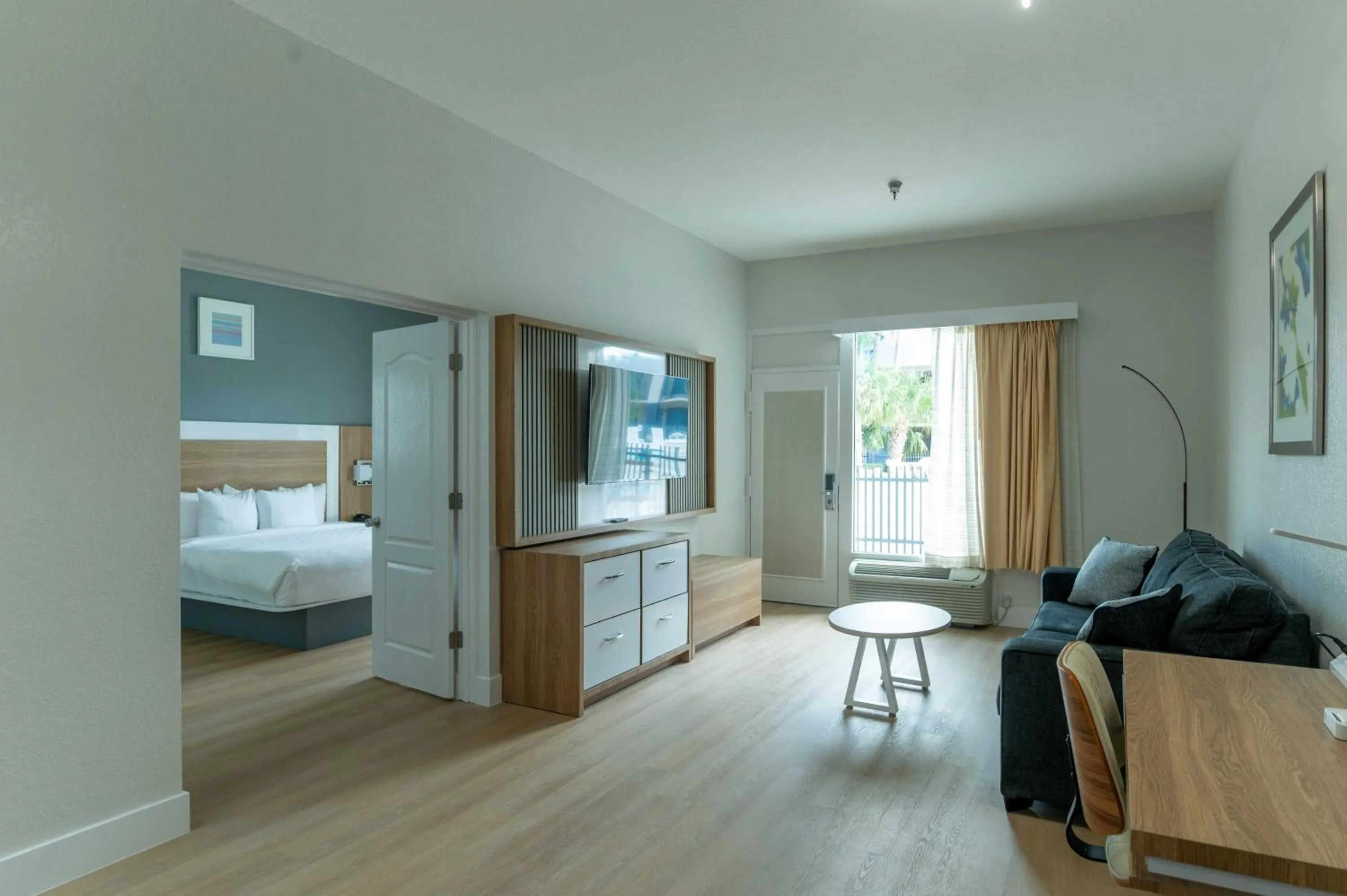 Bed in Clarion Inn & Suites Central Clearwater Beach