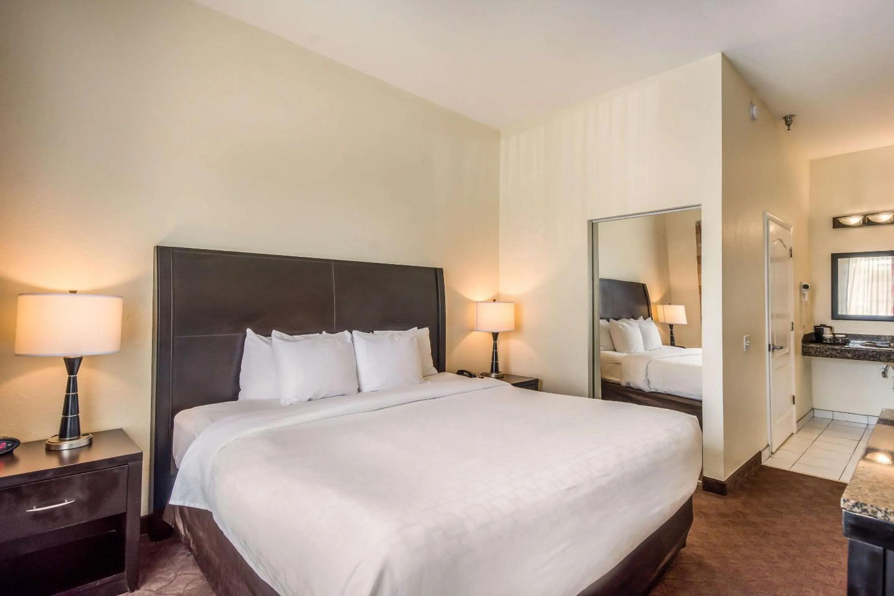 Photo of the whole room, Bed in Clarion Inn & Suites Central Clearwater Beach