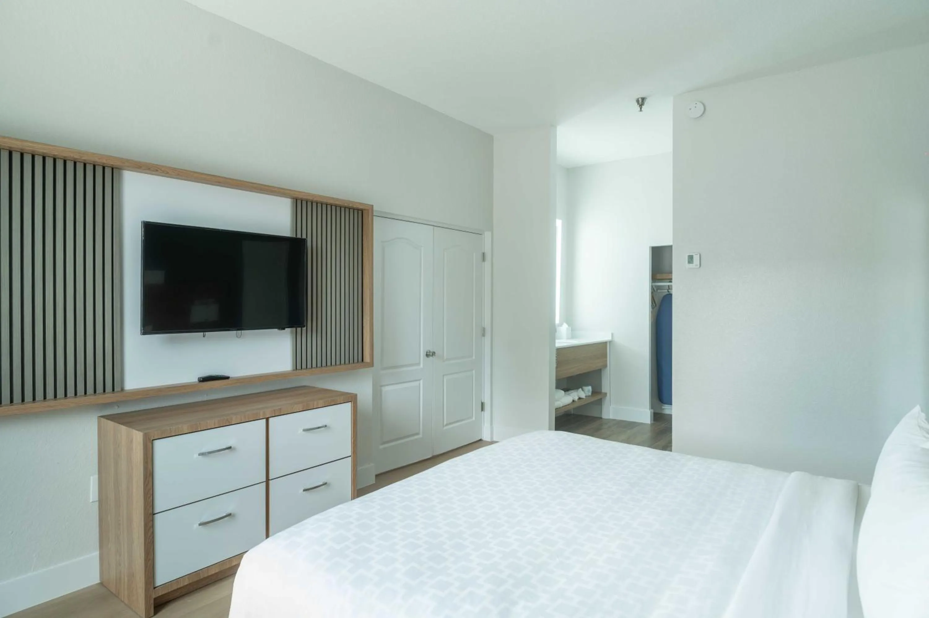 Bed in Clarion Inn & Suites Central Clearwater Beach