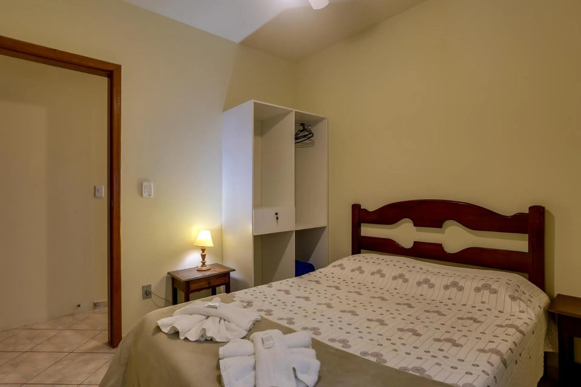 Bed in Pousada Carolina