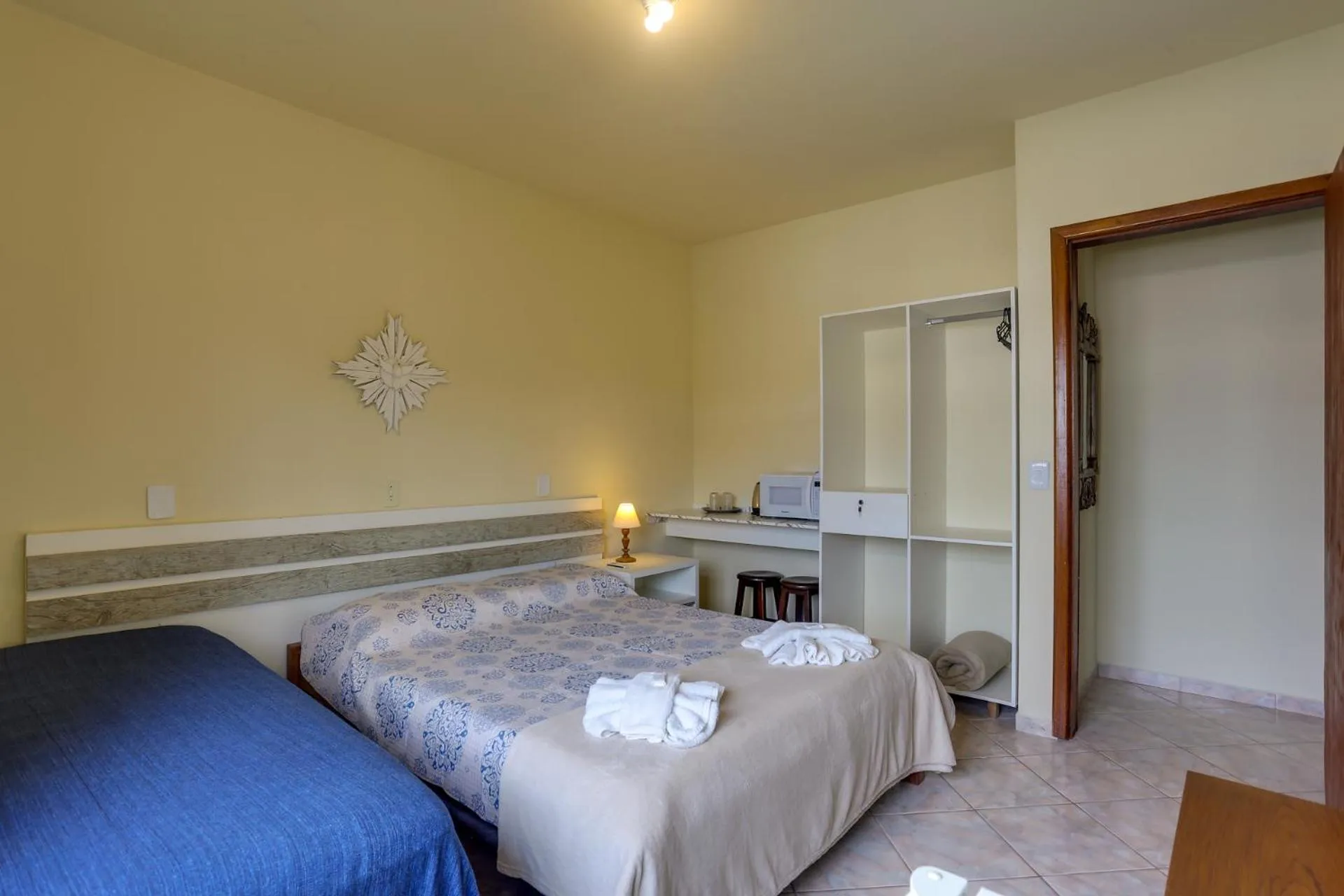 Bed in Pousada Carolina