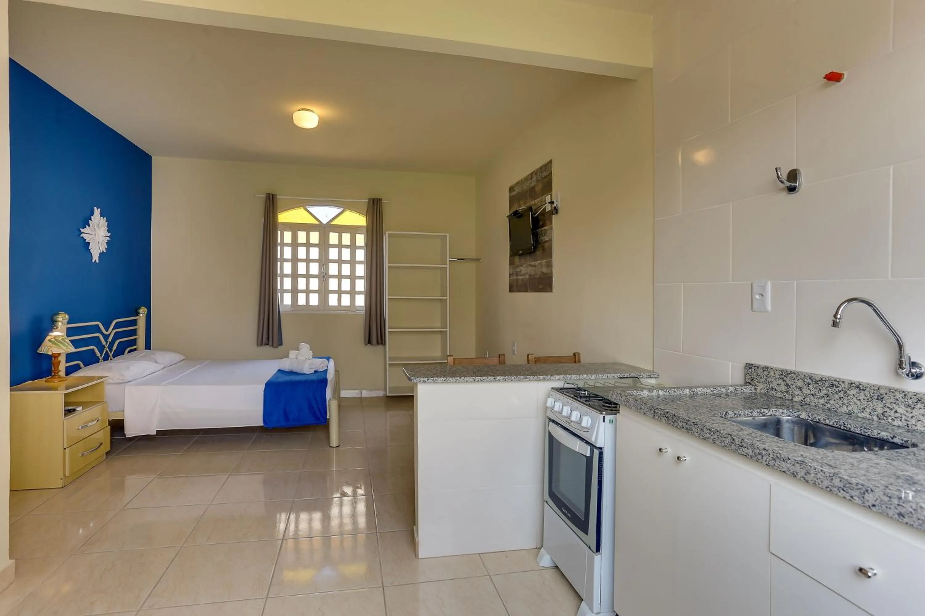 Bed in Pousada Carolina