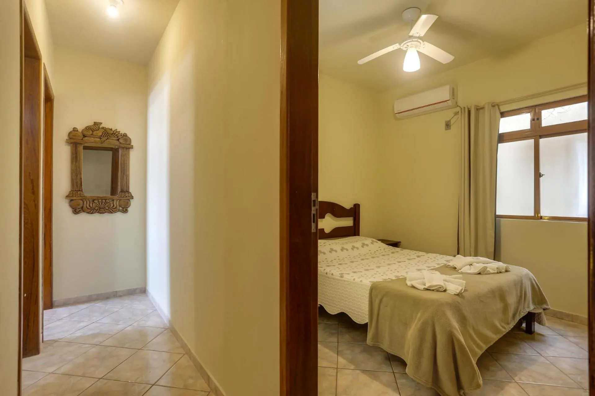 Bed in Pousada Carolina