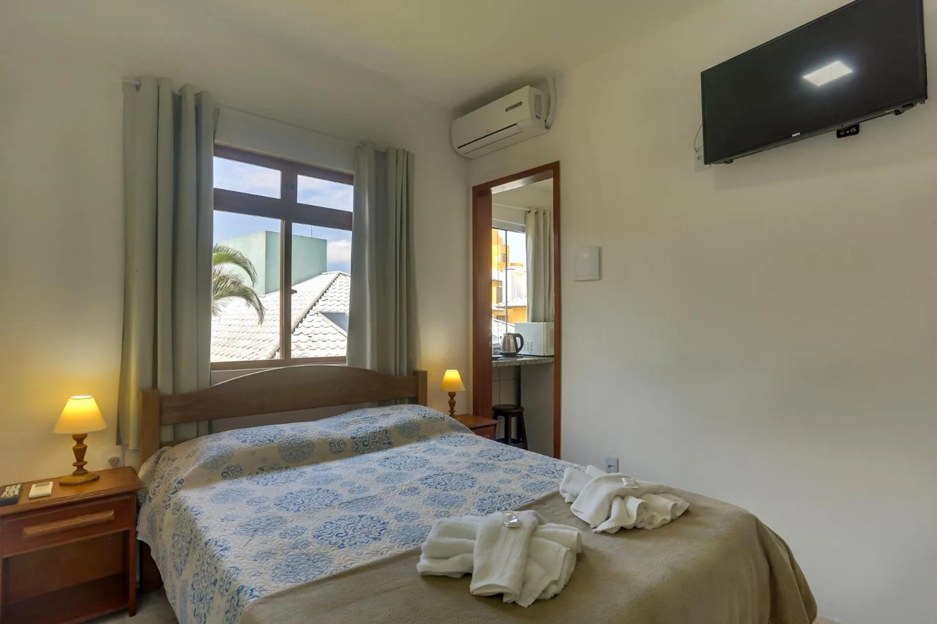 Bed in Pousada Carolina