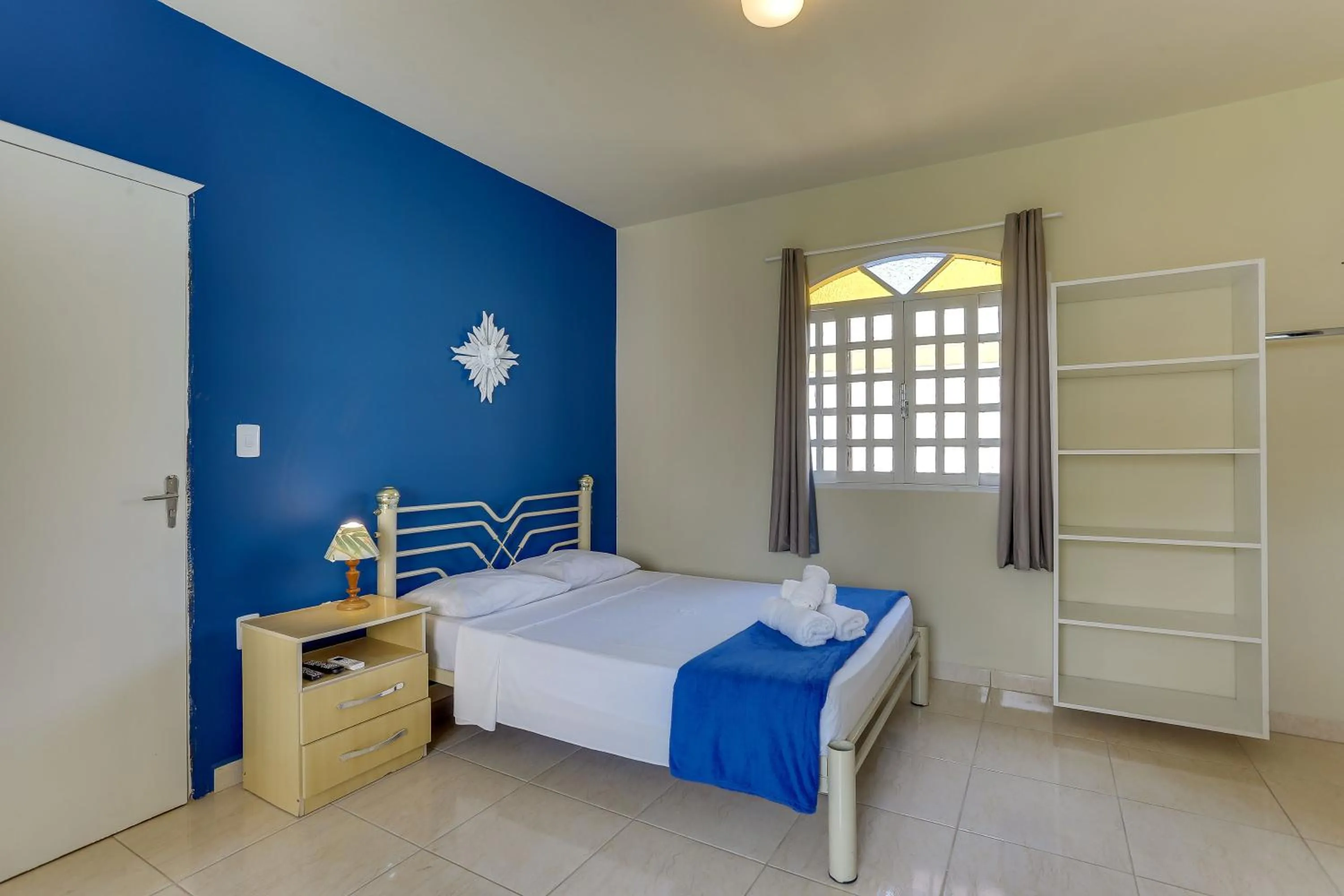 Bed in Pousada Carolina