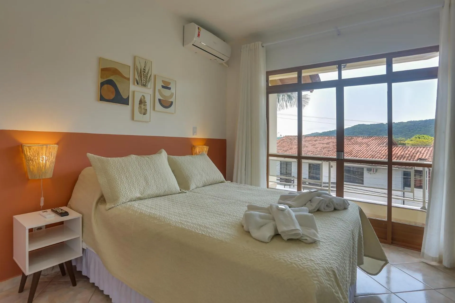 Bed in Pousada Carolina