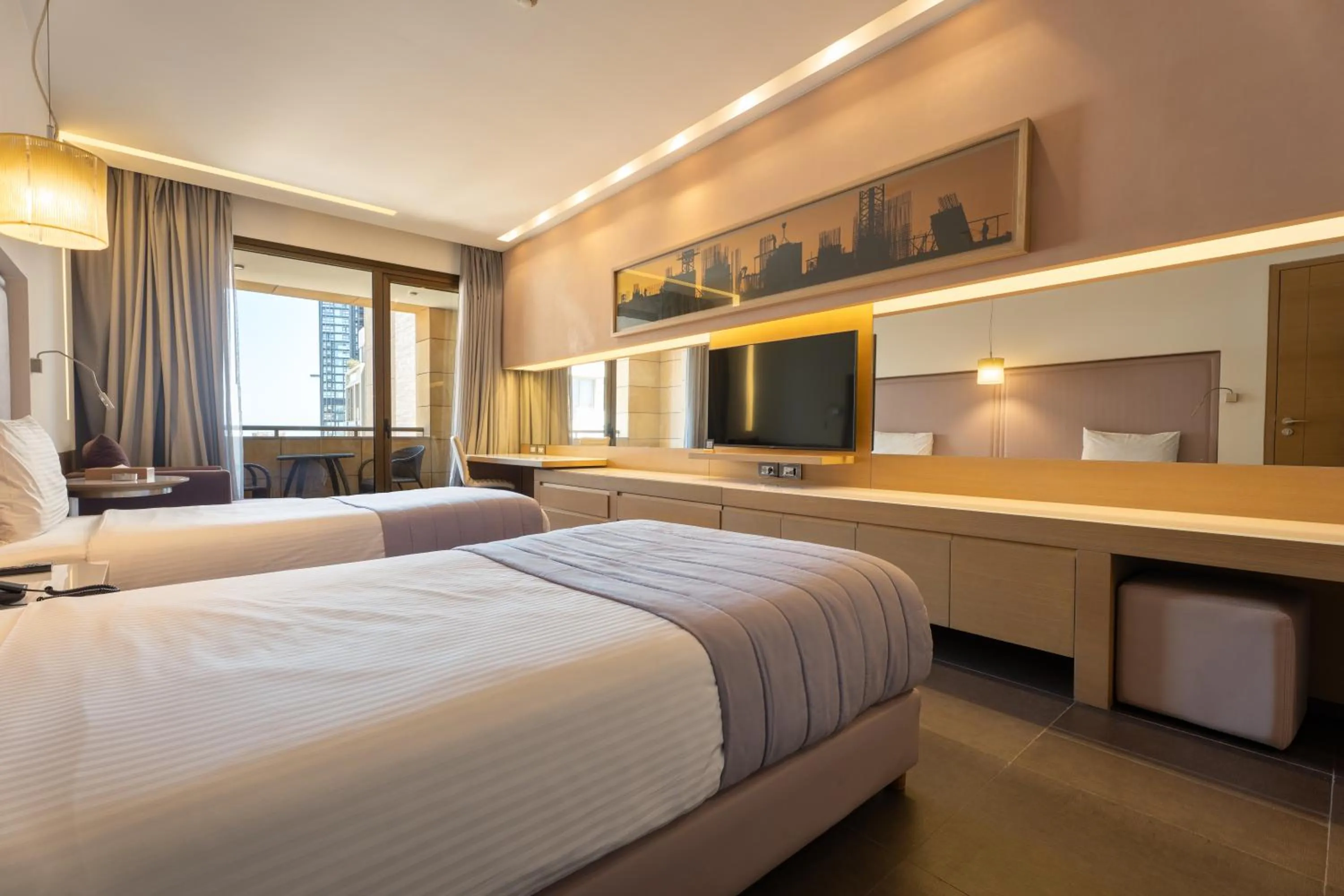 Bed in Saifi Suites Hotel