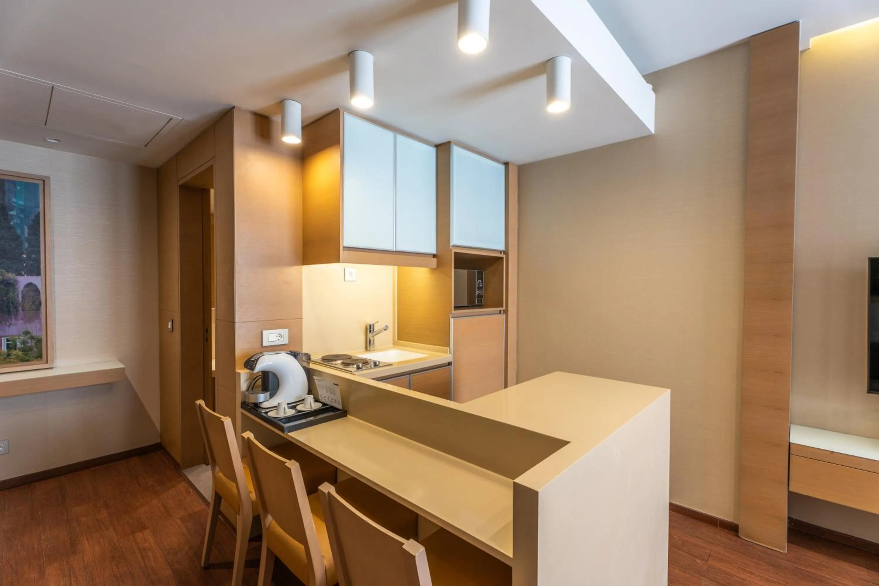 Kitchen or kitchenette in Saifi Suites Hotel