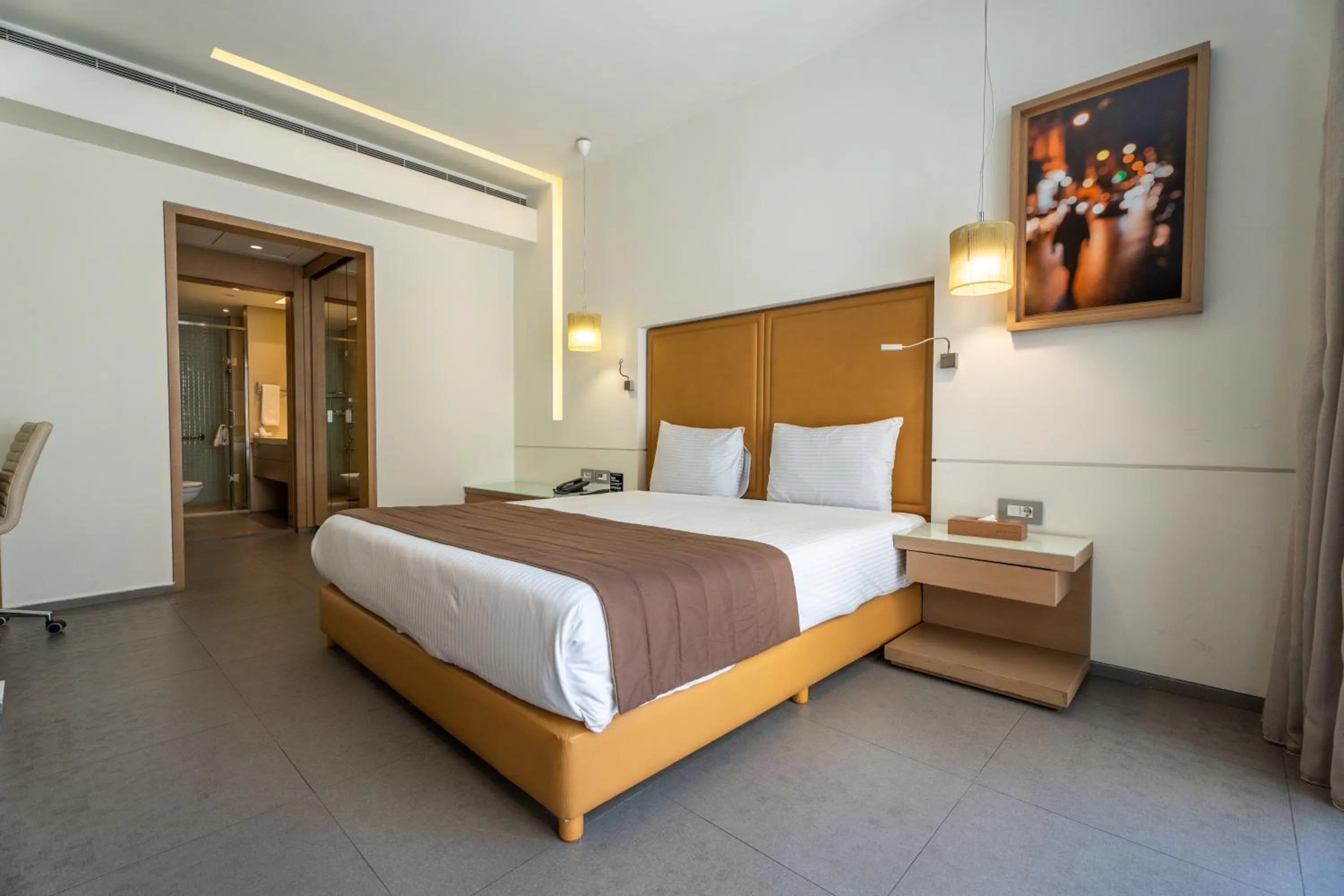 Bed in Saifi Suites Hotel