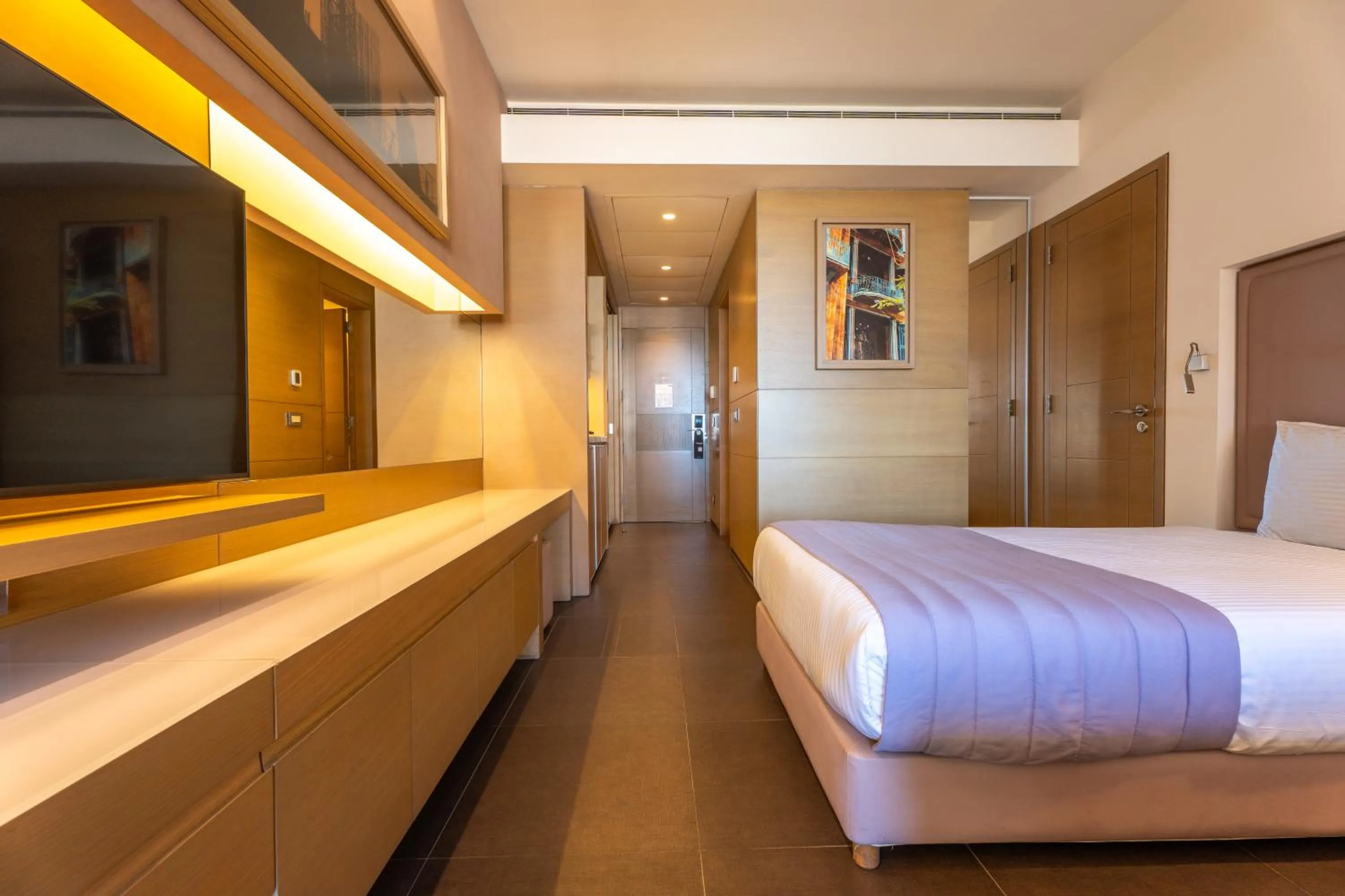 Bed in Saifi Suites Hotel