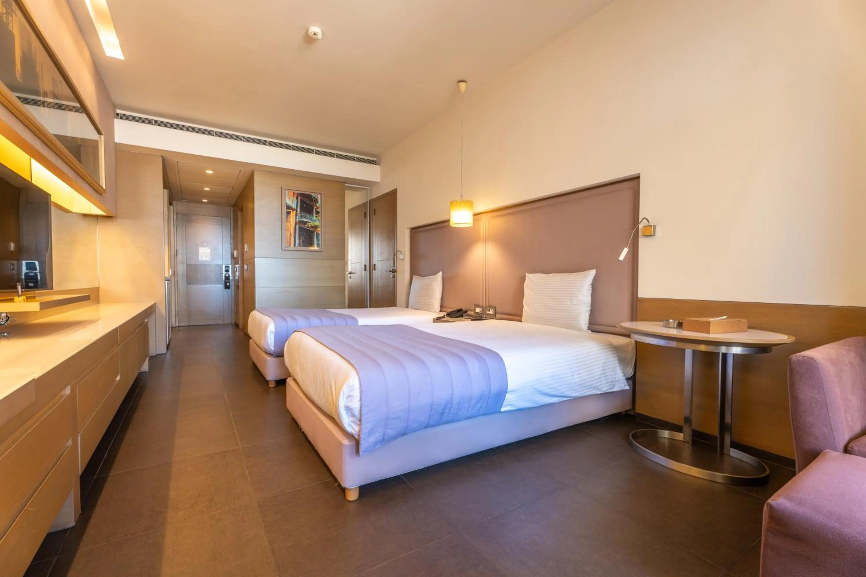 Bed in Saifi Suites Hotel