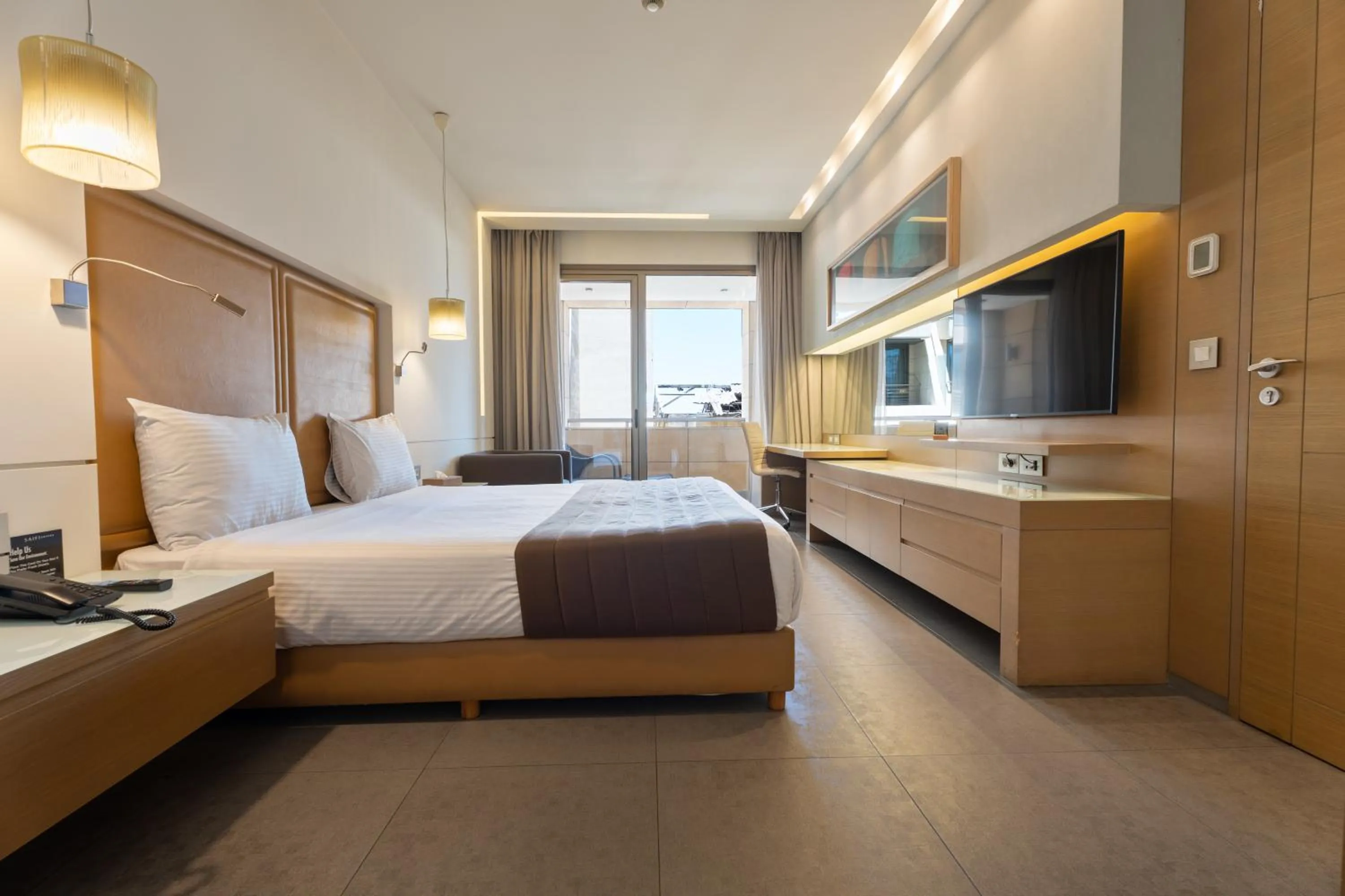 Photo of the whole room, Bed in Saifi Suites Hotel