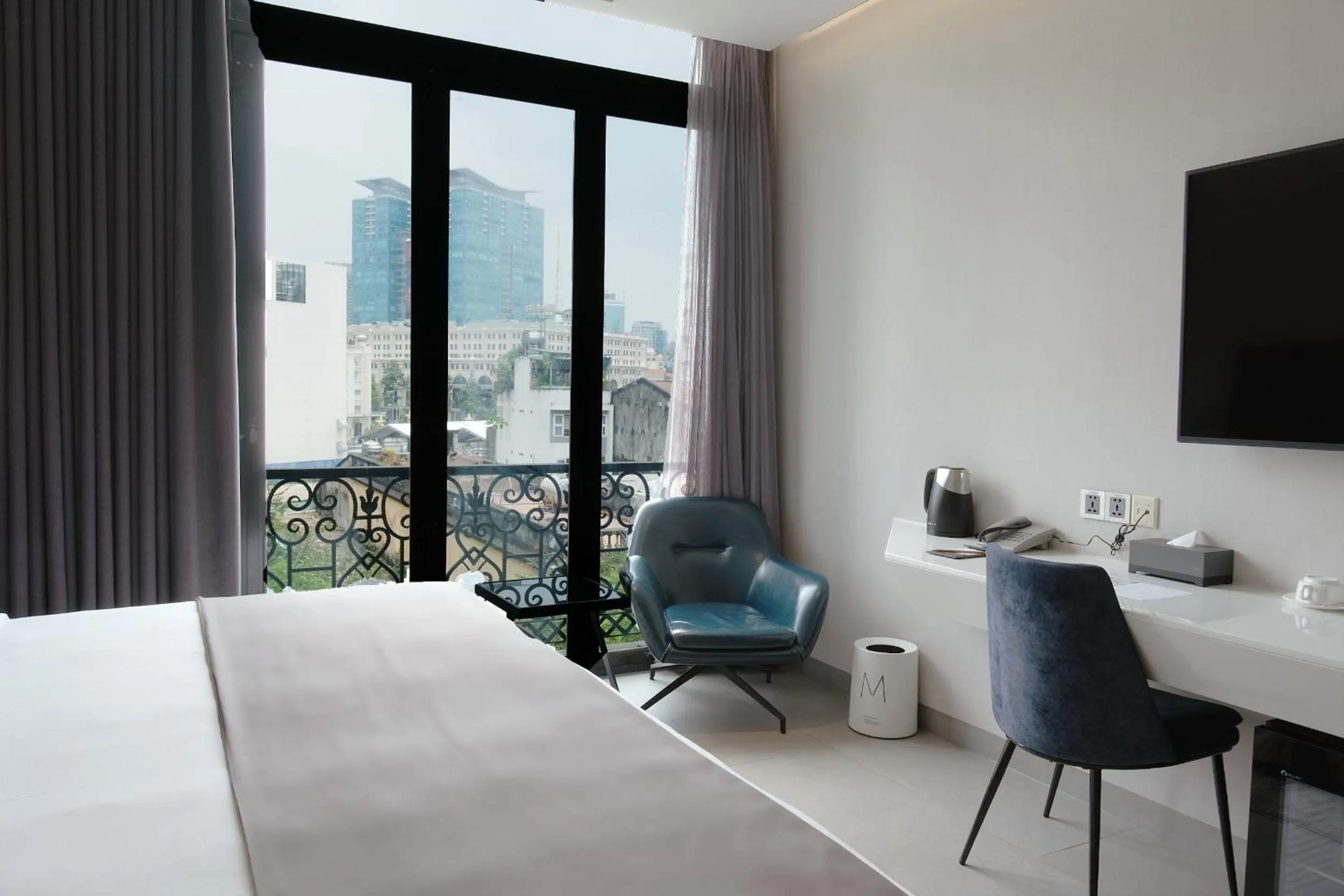 View (from property/room), Bed in M Hotel Saigon