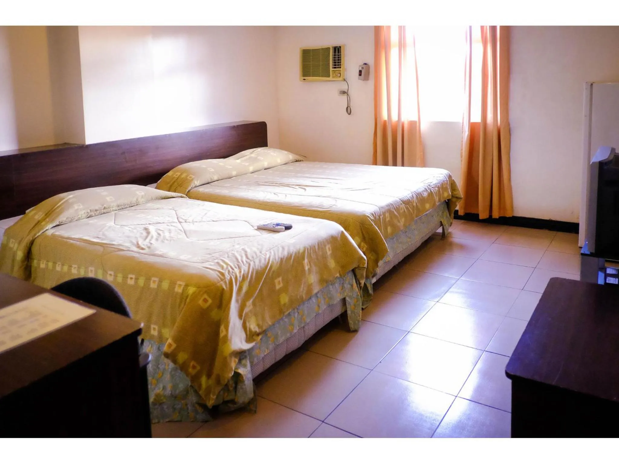 Bed in Crowne Garden Hotel