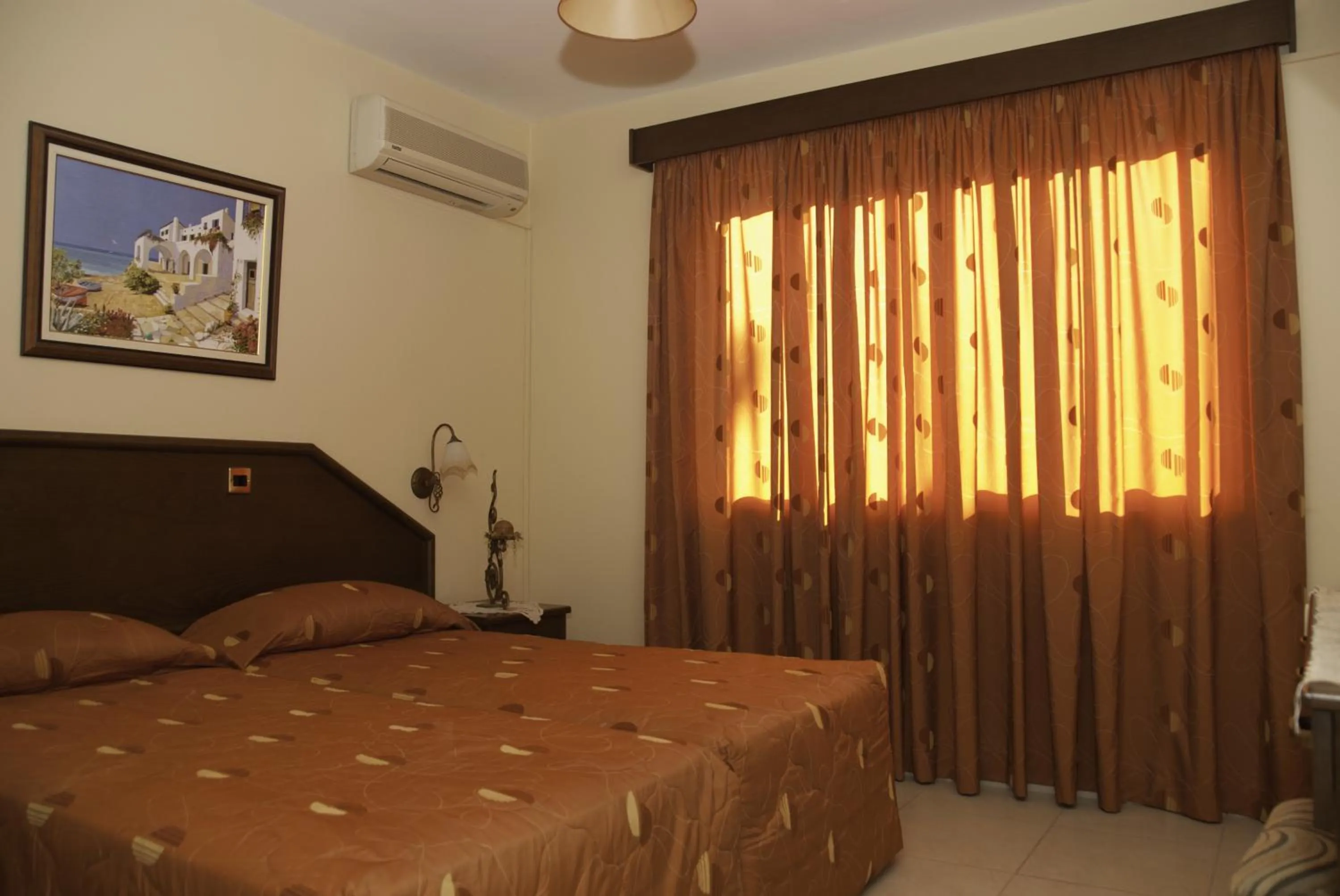 Bed in Kotzias Beach Apartments