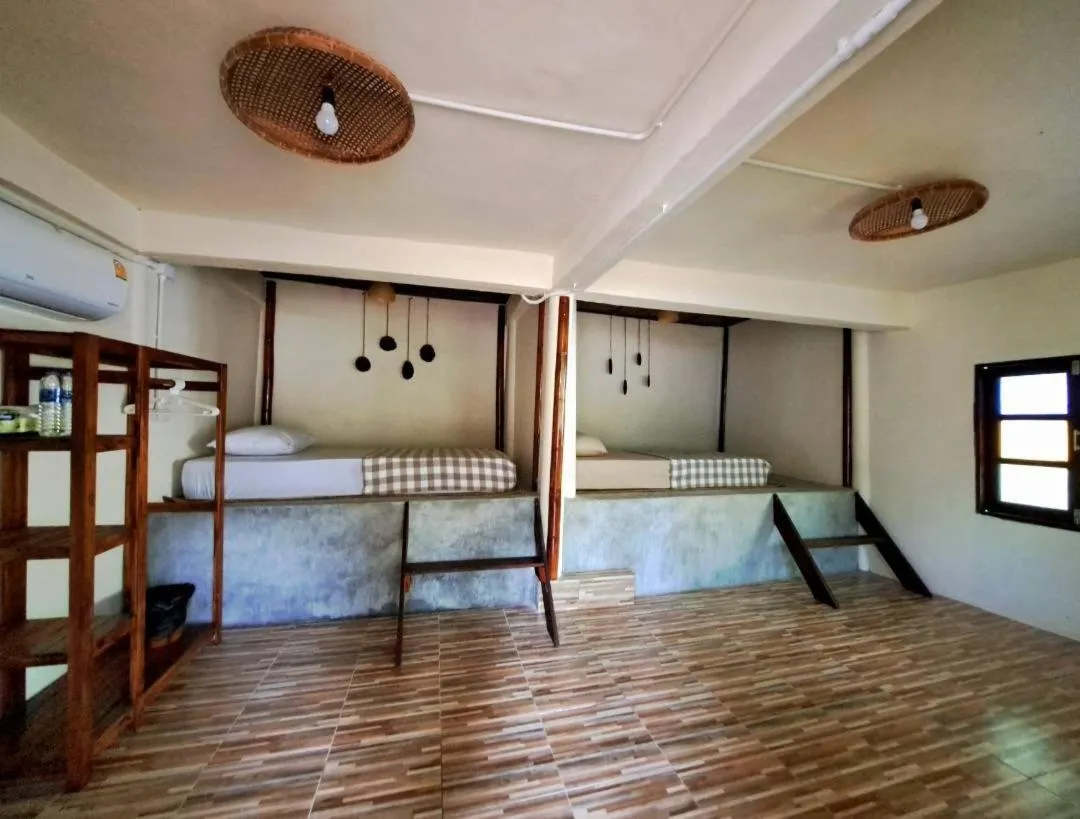 Bed in Mai Pen Rai Bungalows