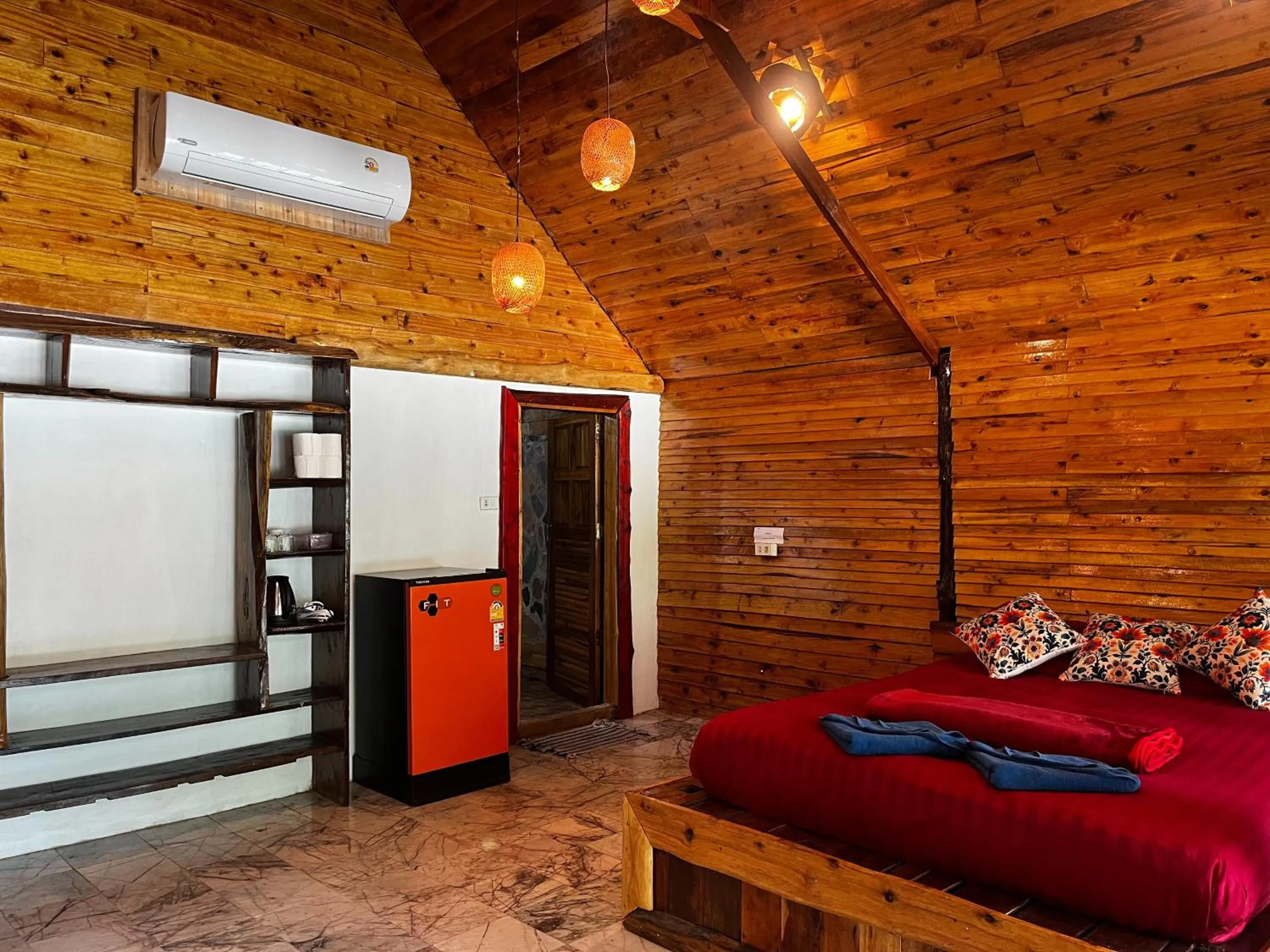 Bed in Mai Pen Rai Bungalows