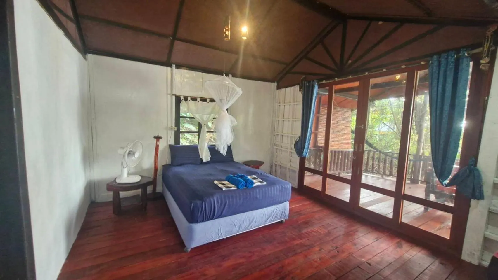 Bed in Mai Pen Rai Bungalows