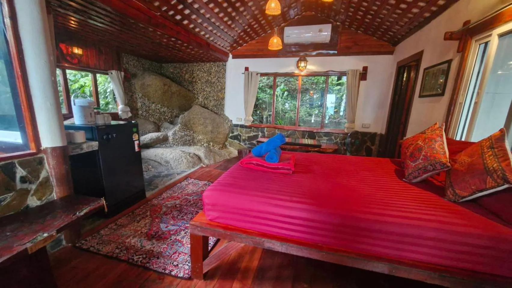 Bed in Mai Pen Rai Bungalows