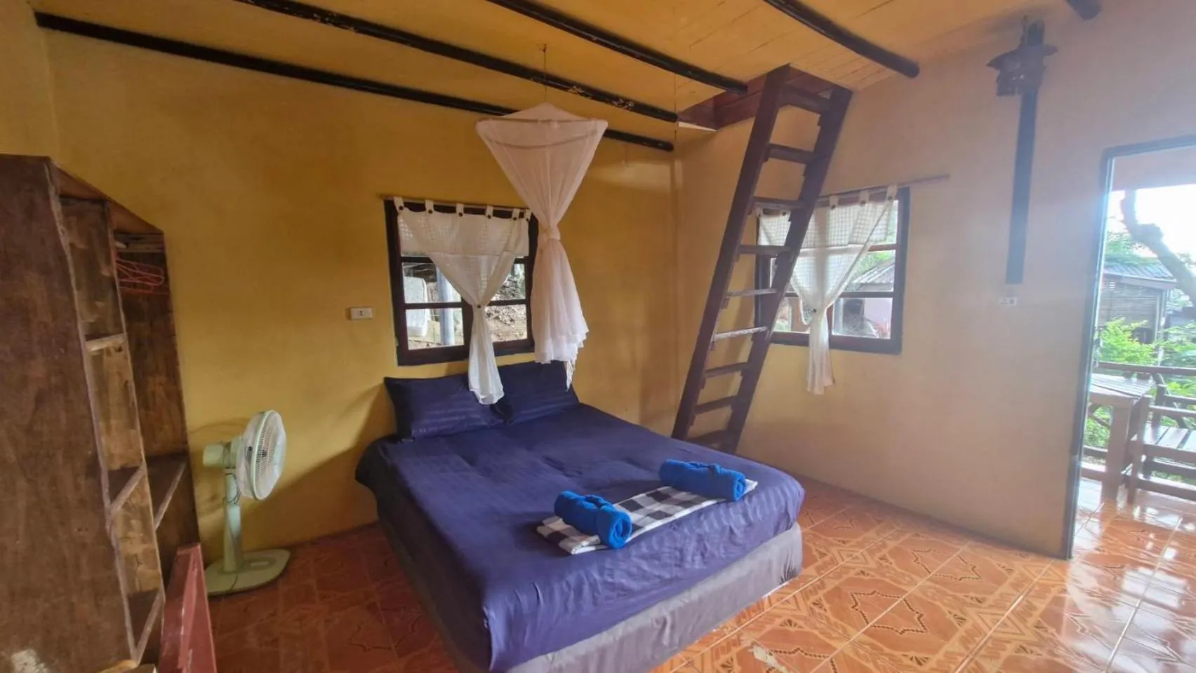 Bed in Mai Pen Rai Bungalows