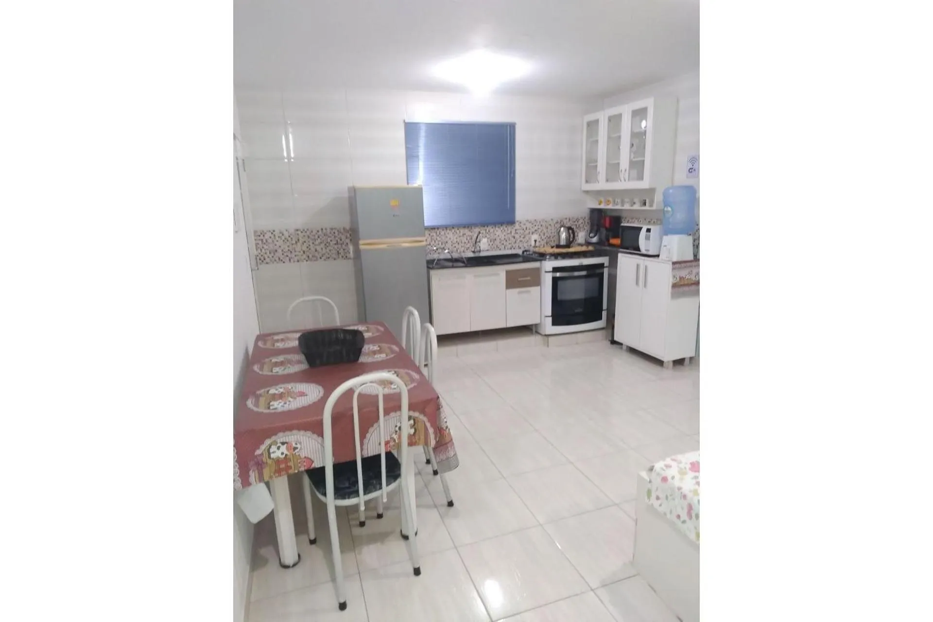 Kitchen or kitchenette in Pousada Souza