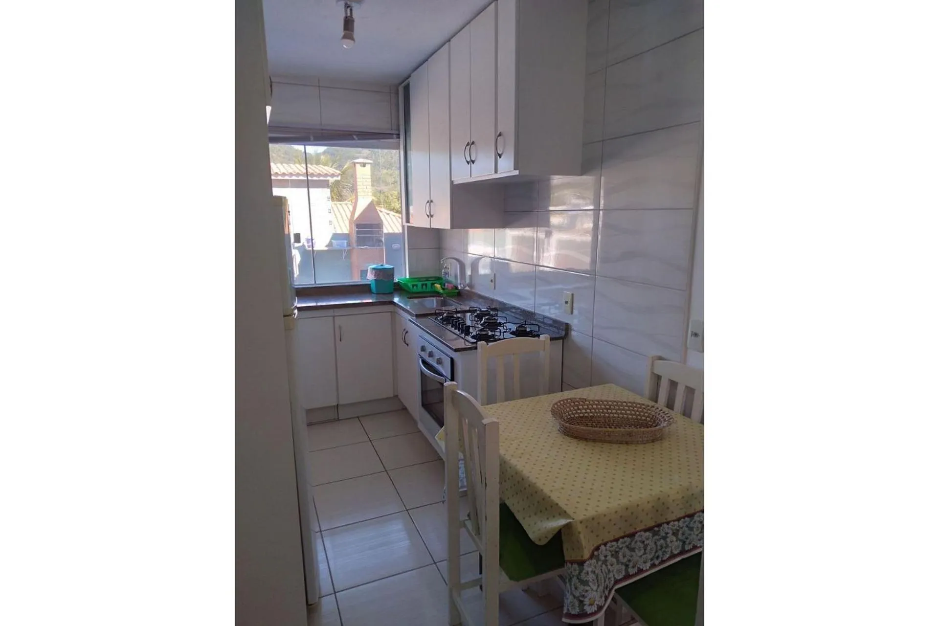 Kitchen or kitchenette in Pousada Souza