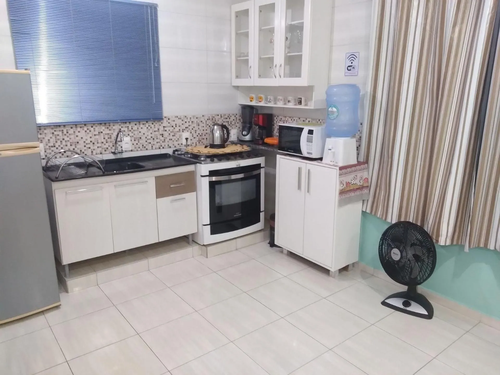 Kitchen or kitchenette in Pousada Souza