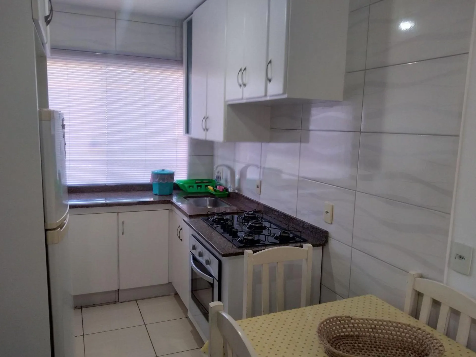 Kitchen or kitchenette in Pousada Souza