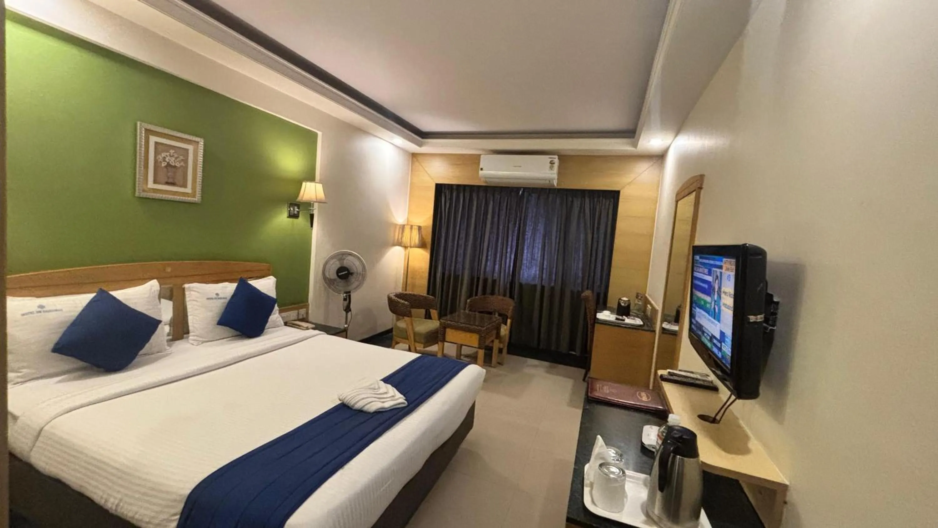 Bed in Hotel Dr Rajkumar International