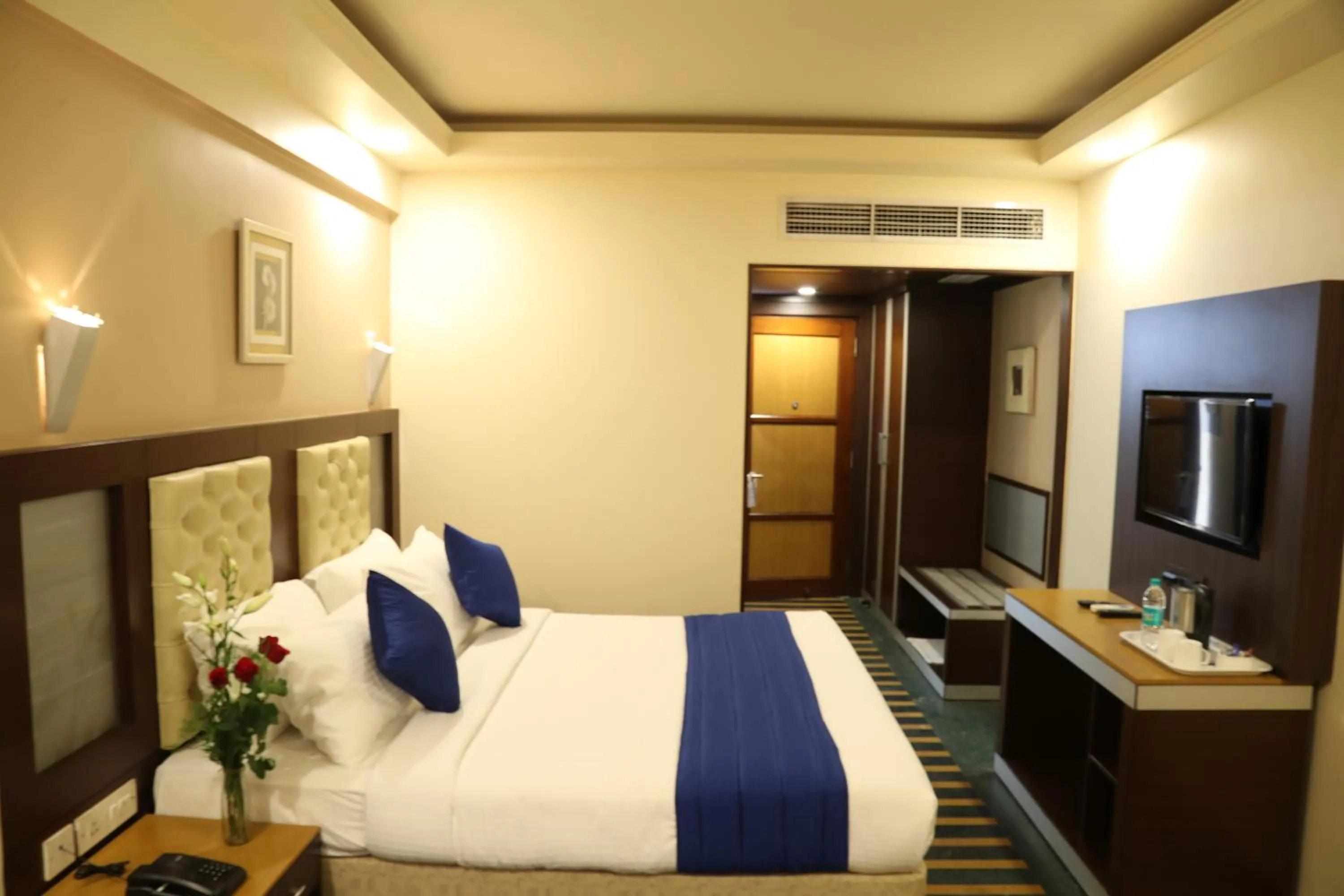 Bed in Hotel Dr Rajkumar International