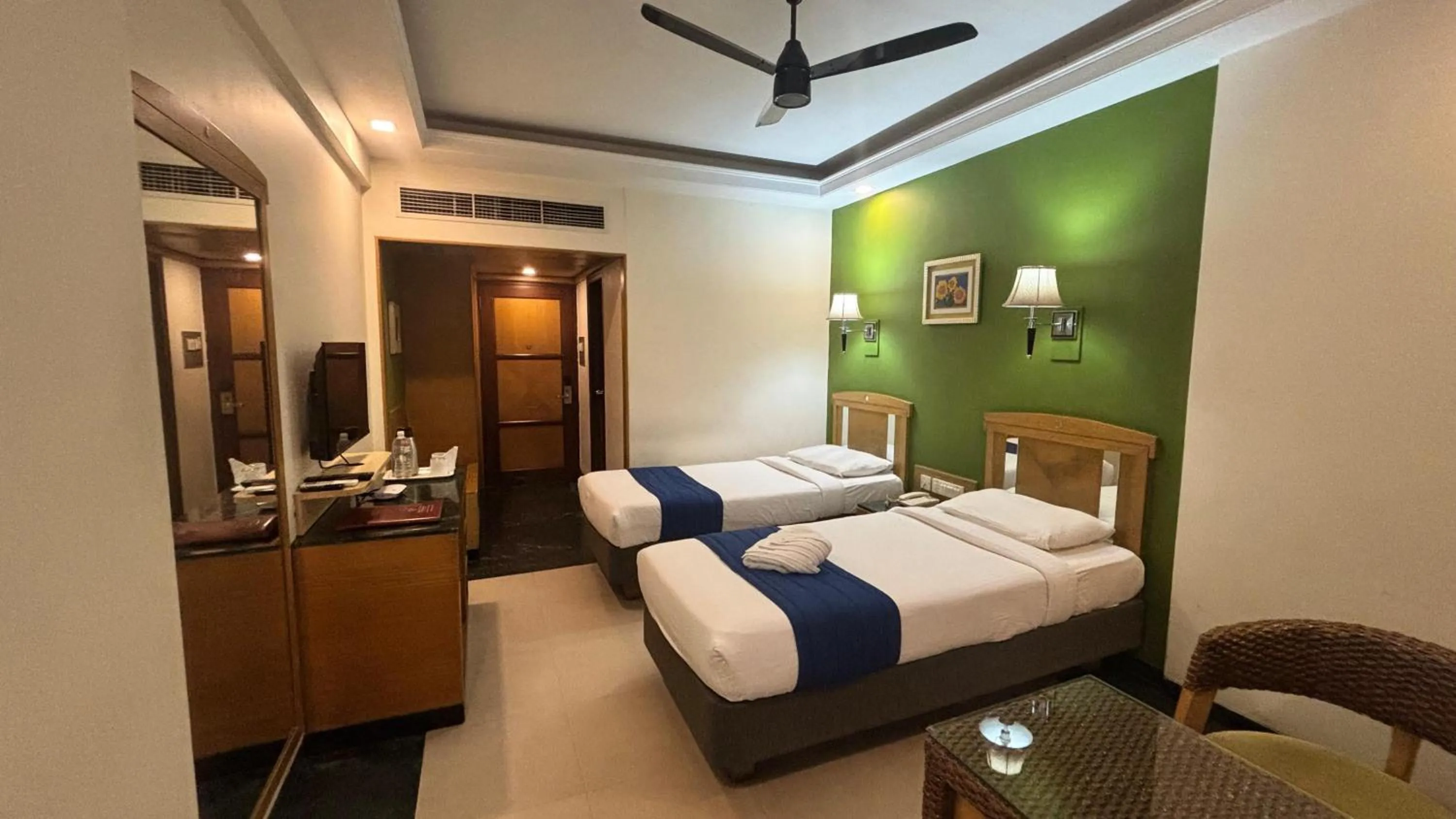 Bed in Hotel Dr Rajkumar International