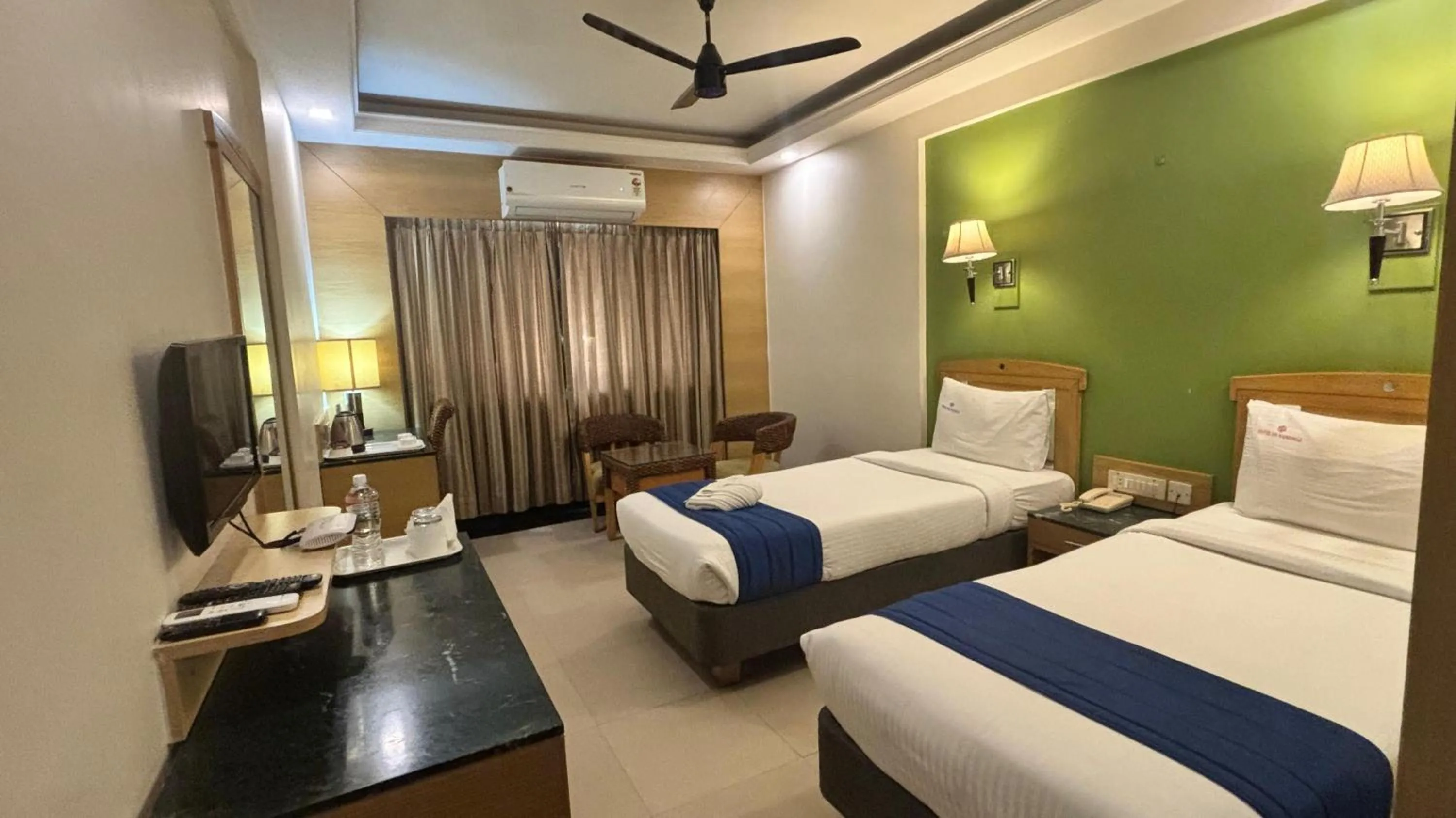 Photo of the whole room, Bed in Hotel Dr Rajkumar International