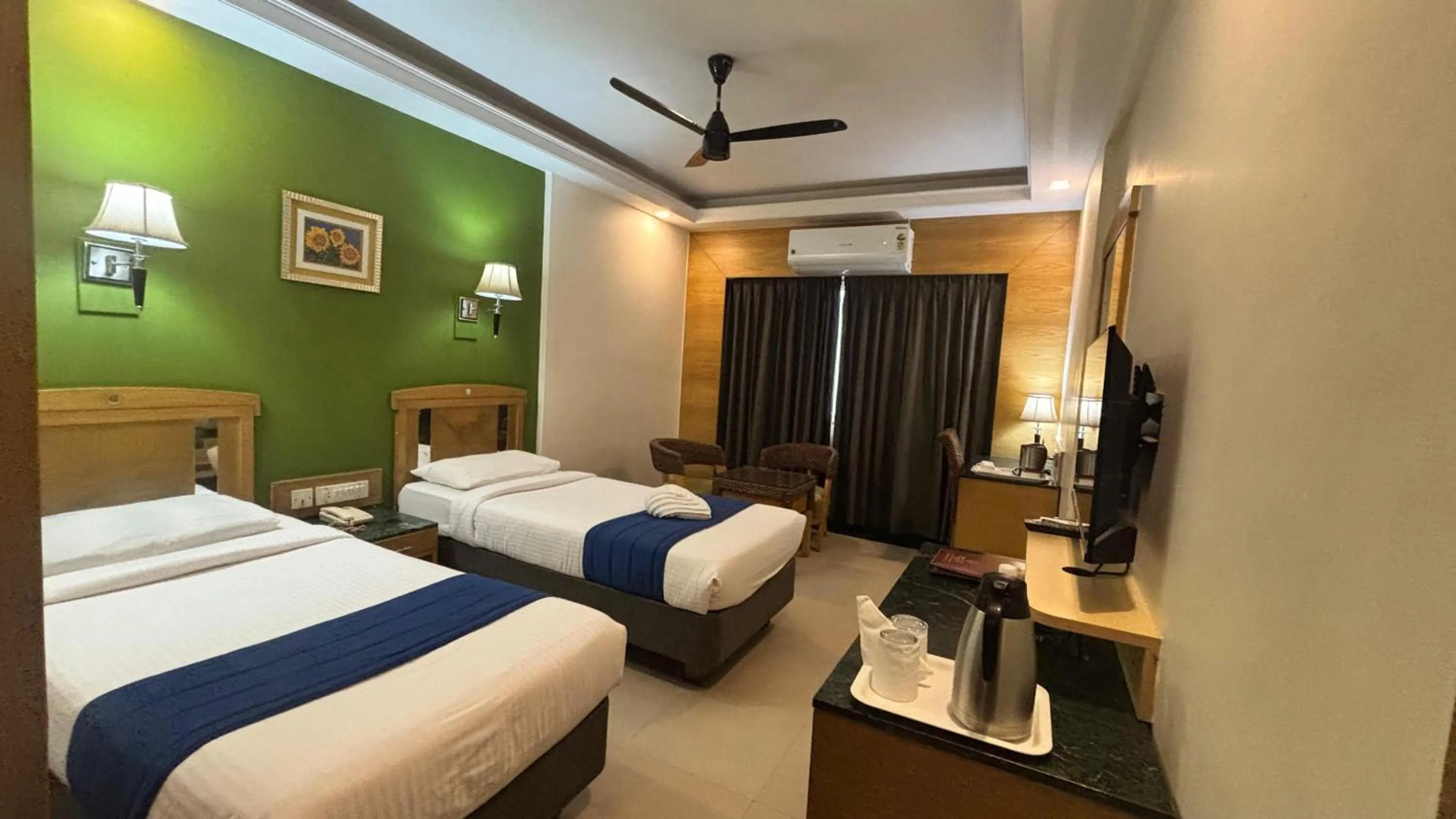 Bed in Hotel Dr Rajkumar International