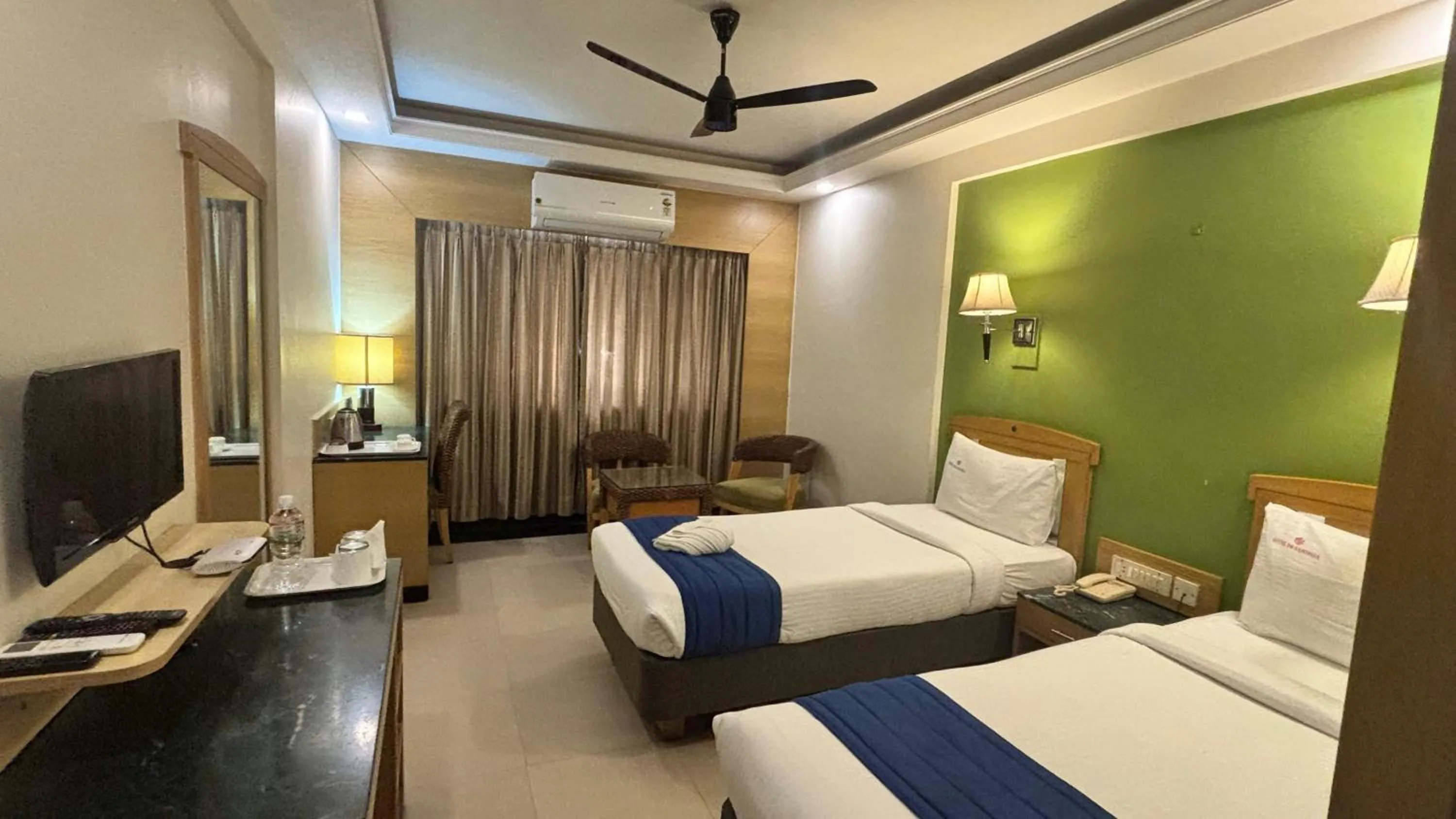 Bed in Hotel Dr Rajkumar International