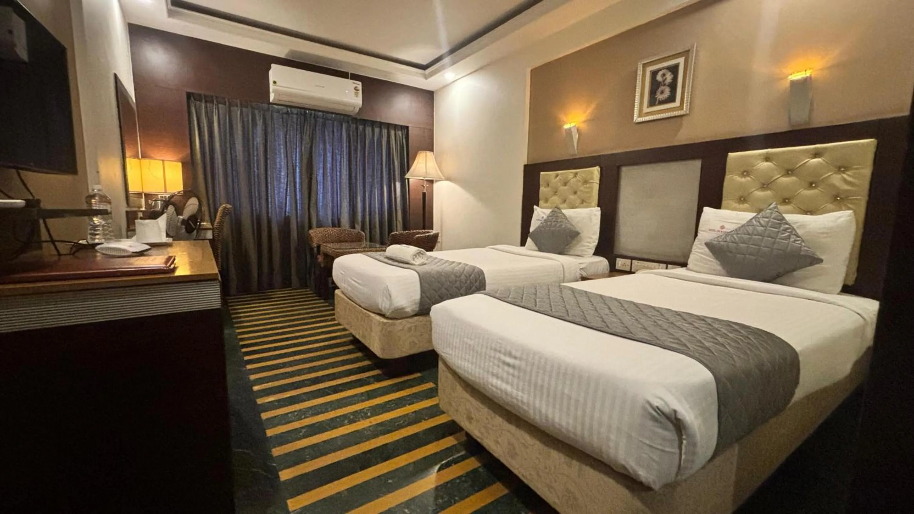 Bed in Hotel Dr Rajkumar International