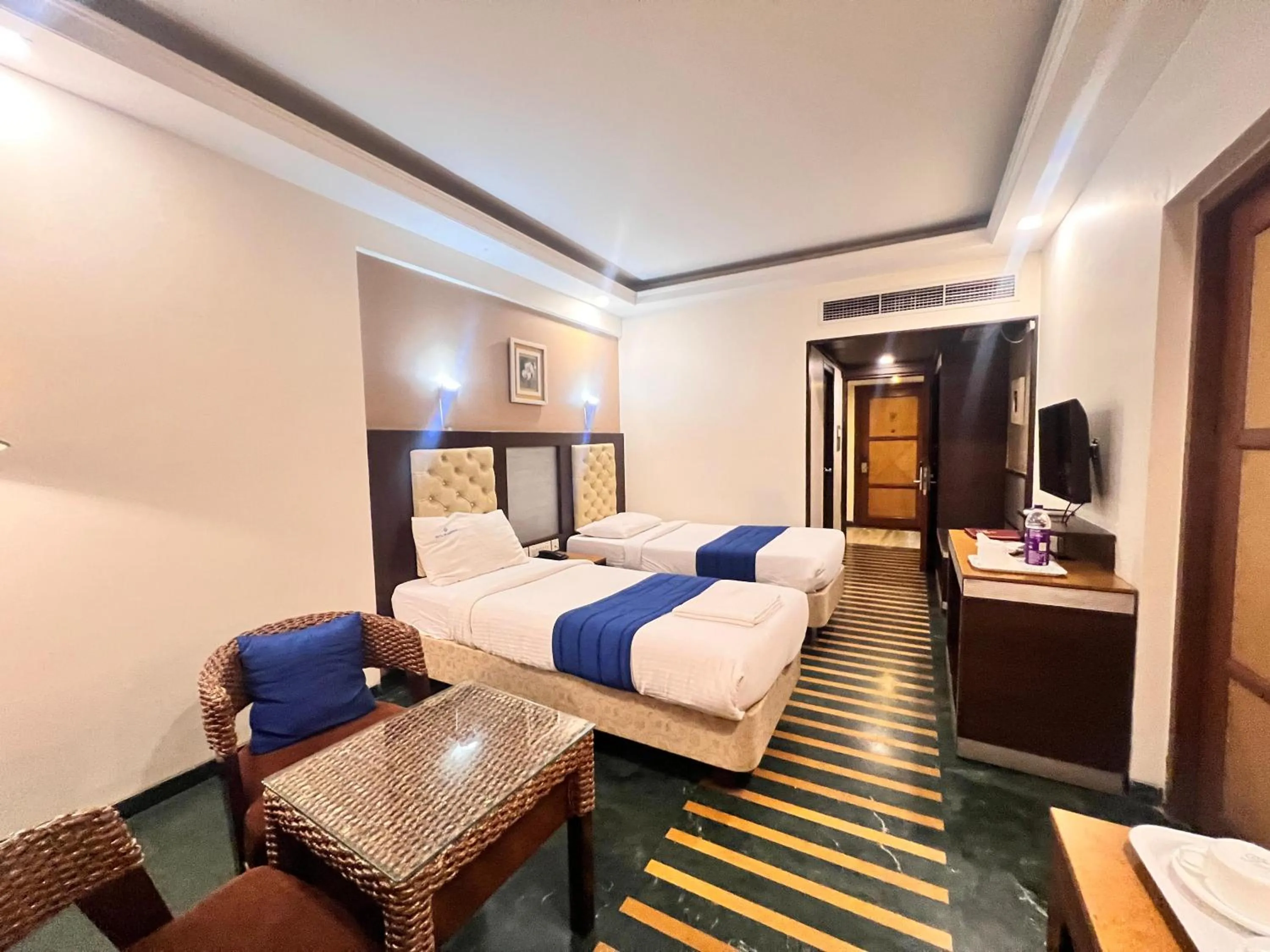 Bed in Hotel Dr Rajkumar International