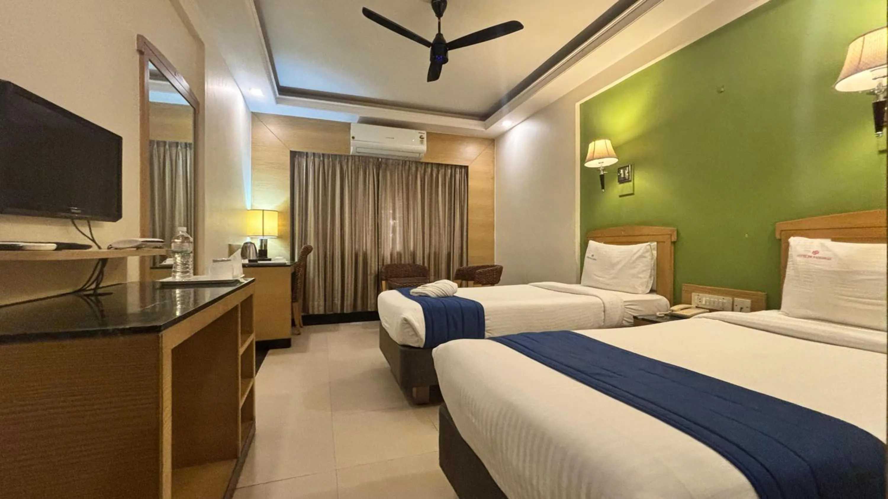 Bed in Hotel Dr Rajkumar International