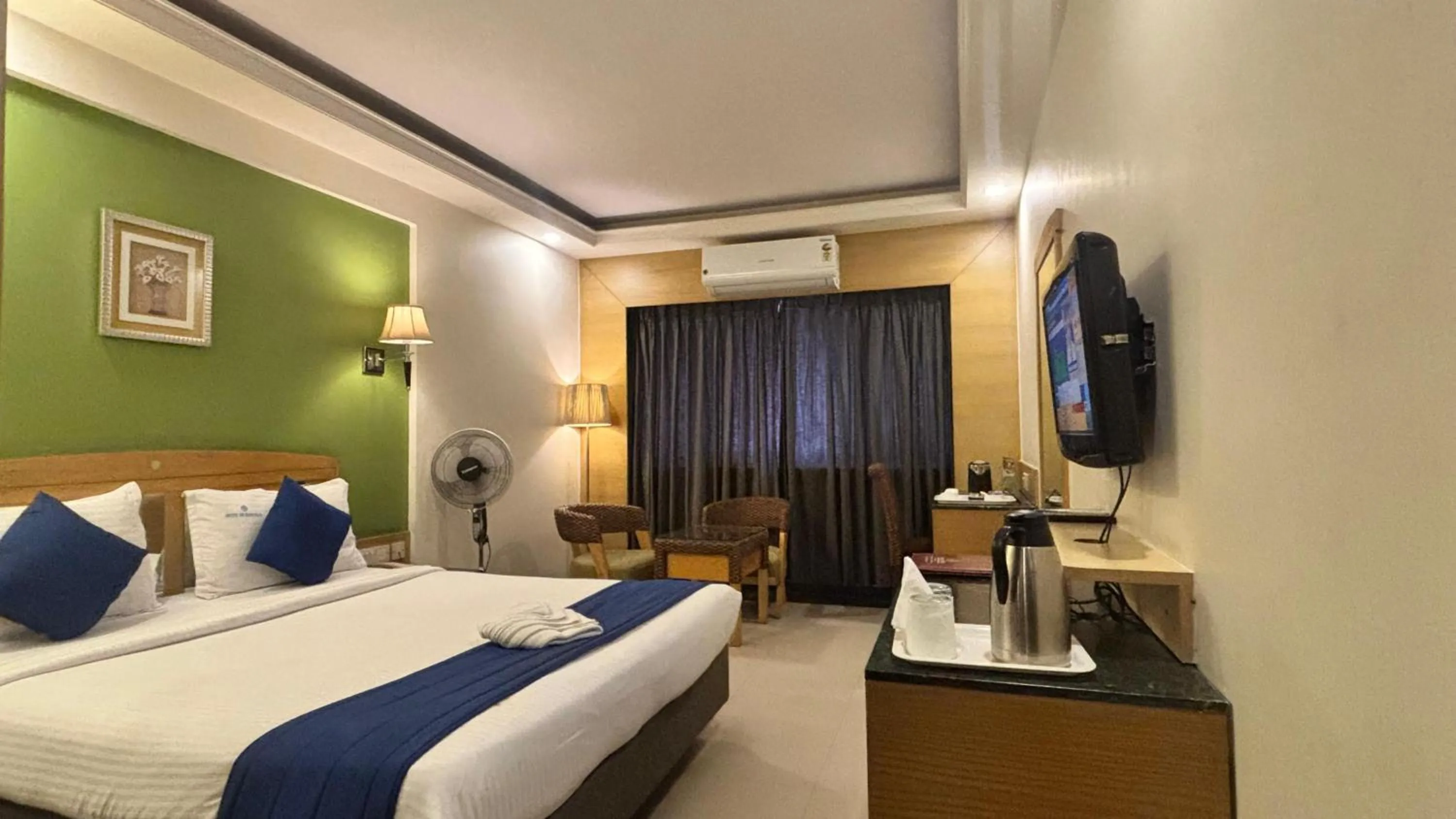 Bed in Hotel Dr Rajkumar International